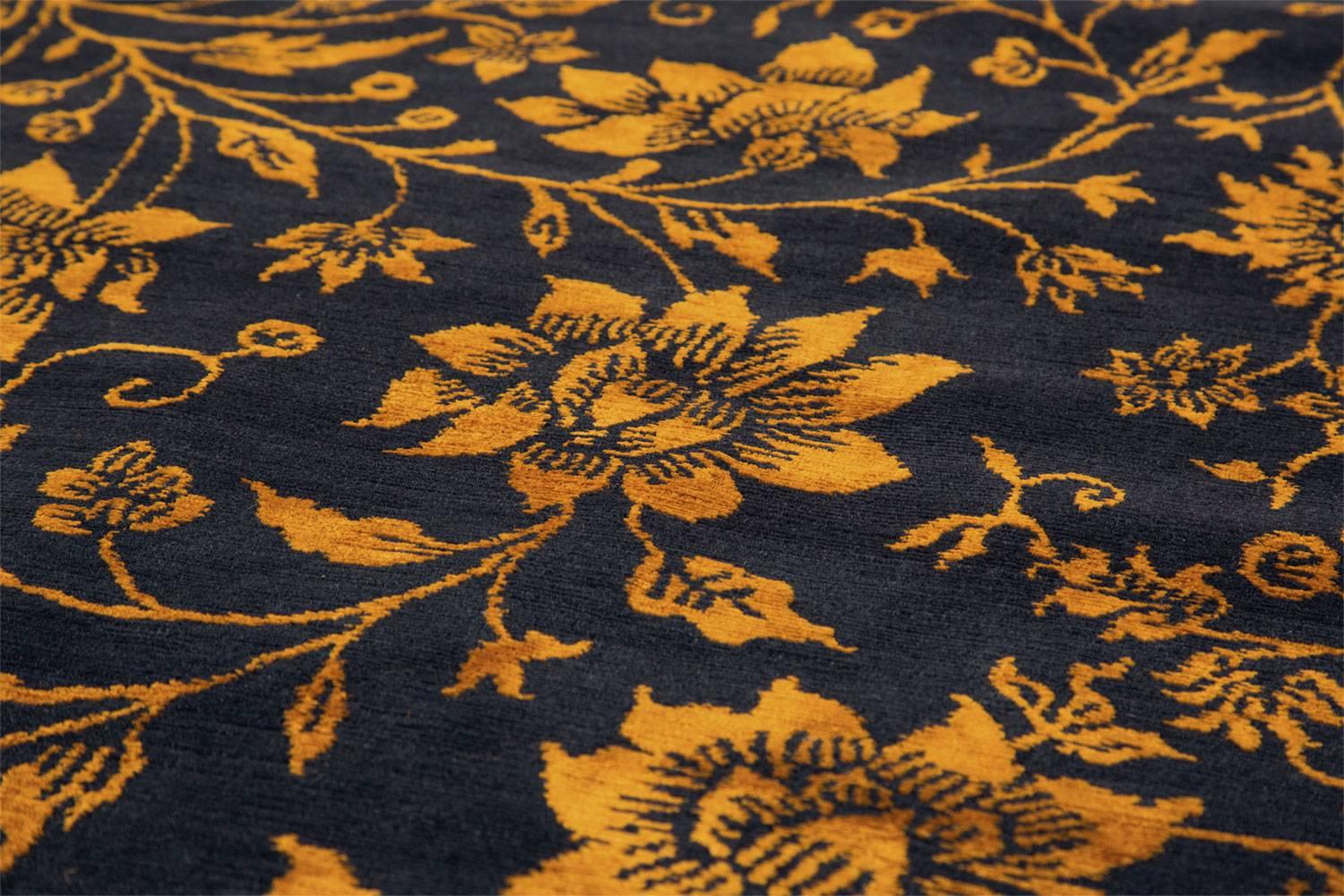 Designed by Joseph Carini, this classical floral area rug is a departure from his usual contemporary work and part of the 'Classical Flowers' collection inspired by 16th century Italian leather work. The fine yellow flowers stand in contrast to