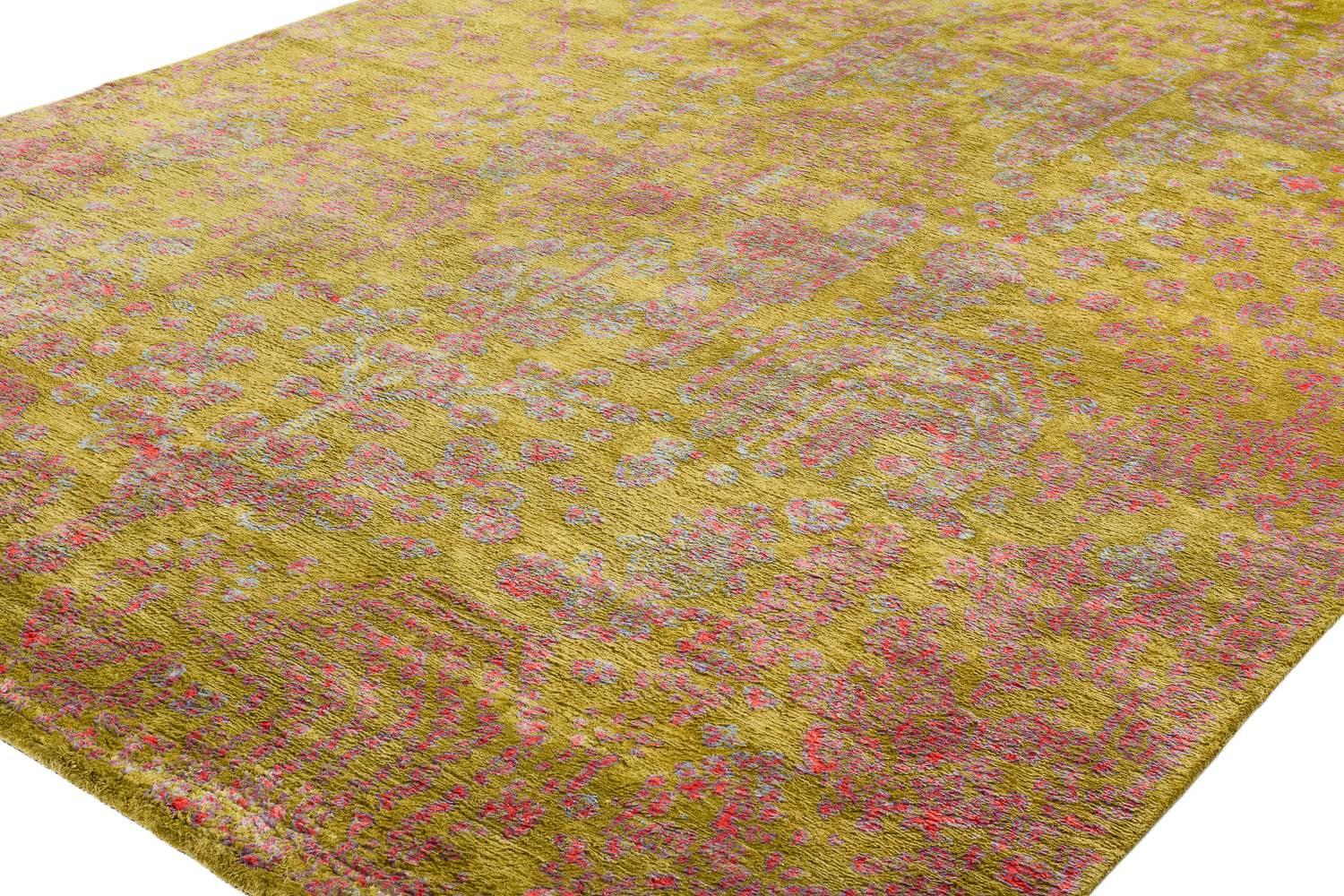 The 'Ankara' design is a glistening, delightful jewel within our collection. It’s gorgeous, palette of violet, pink, chartreuse and baby blue gives it an uplifting palette. In 100% silk with a plush pile height, this rug is as soft as can be and