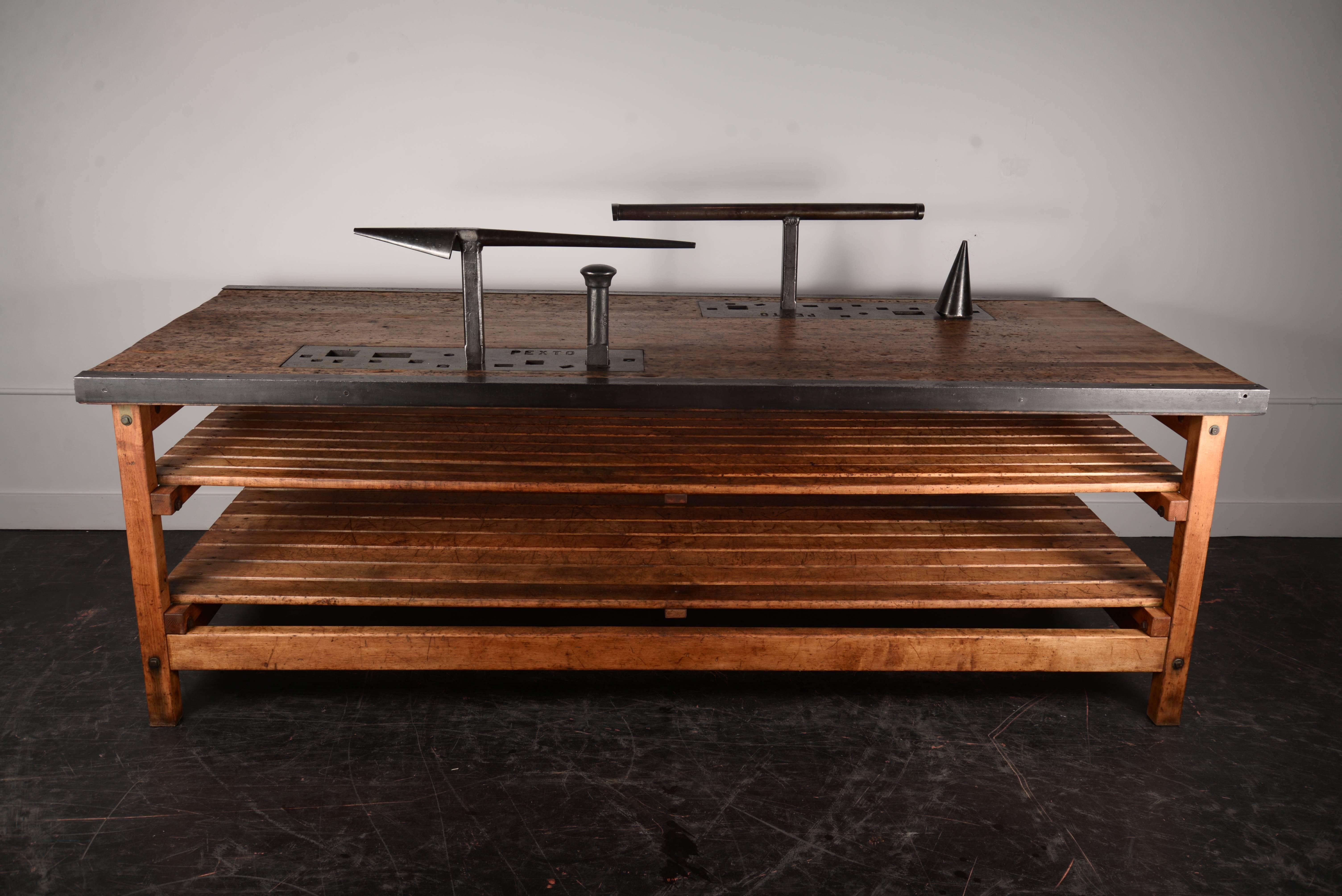 Double-sided training workstation table for blacksmithing. This is constructed out of maple and steel and has been thoroughly cleaned and waxed. A set of original shaping tools come with this table.