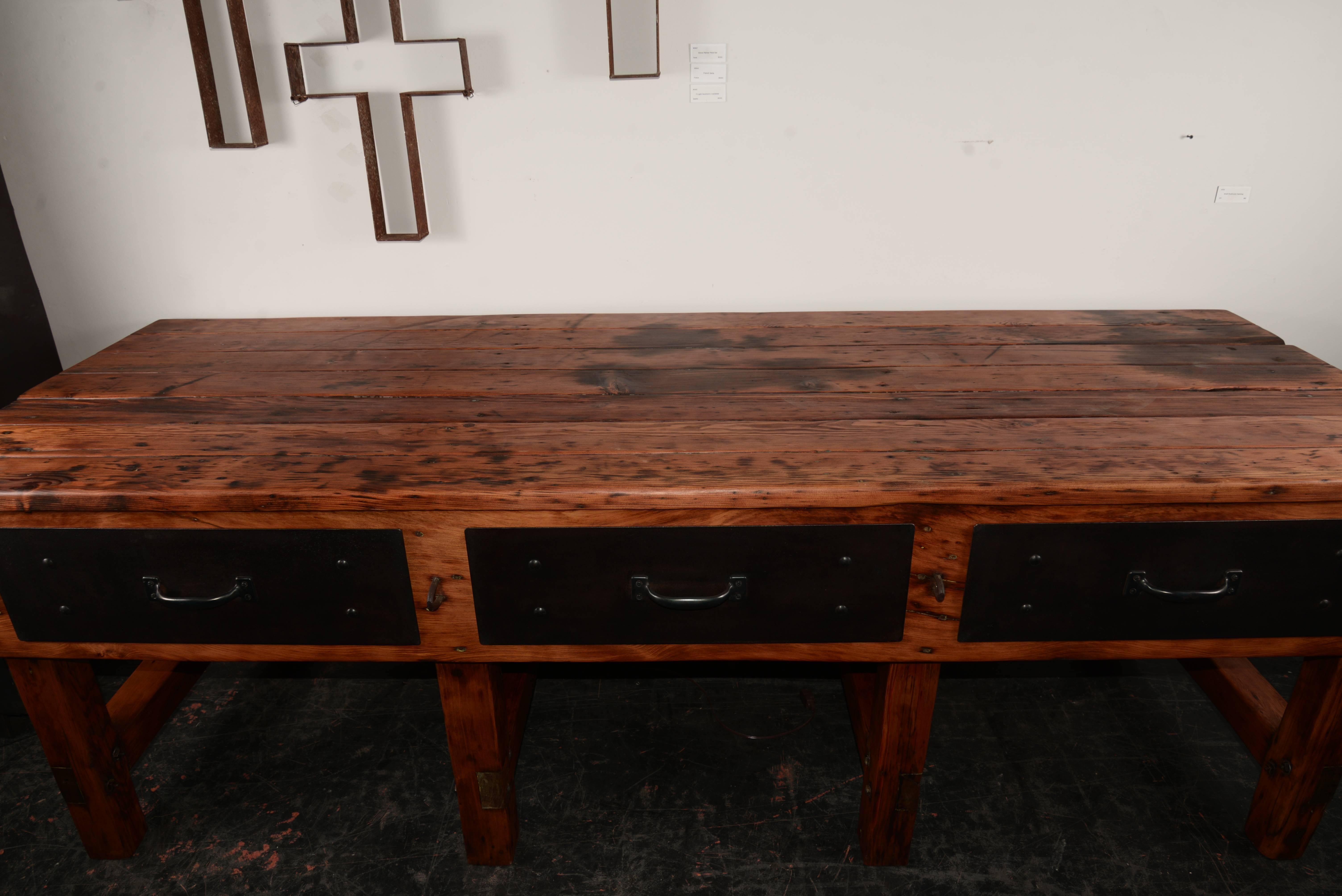 Massive early century douglas fir and steel foremans station. Three deep drawers open and close beautifully. This piece is super clean and ready to enjoy.