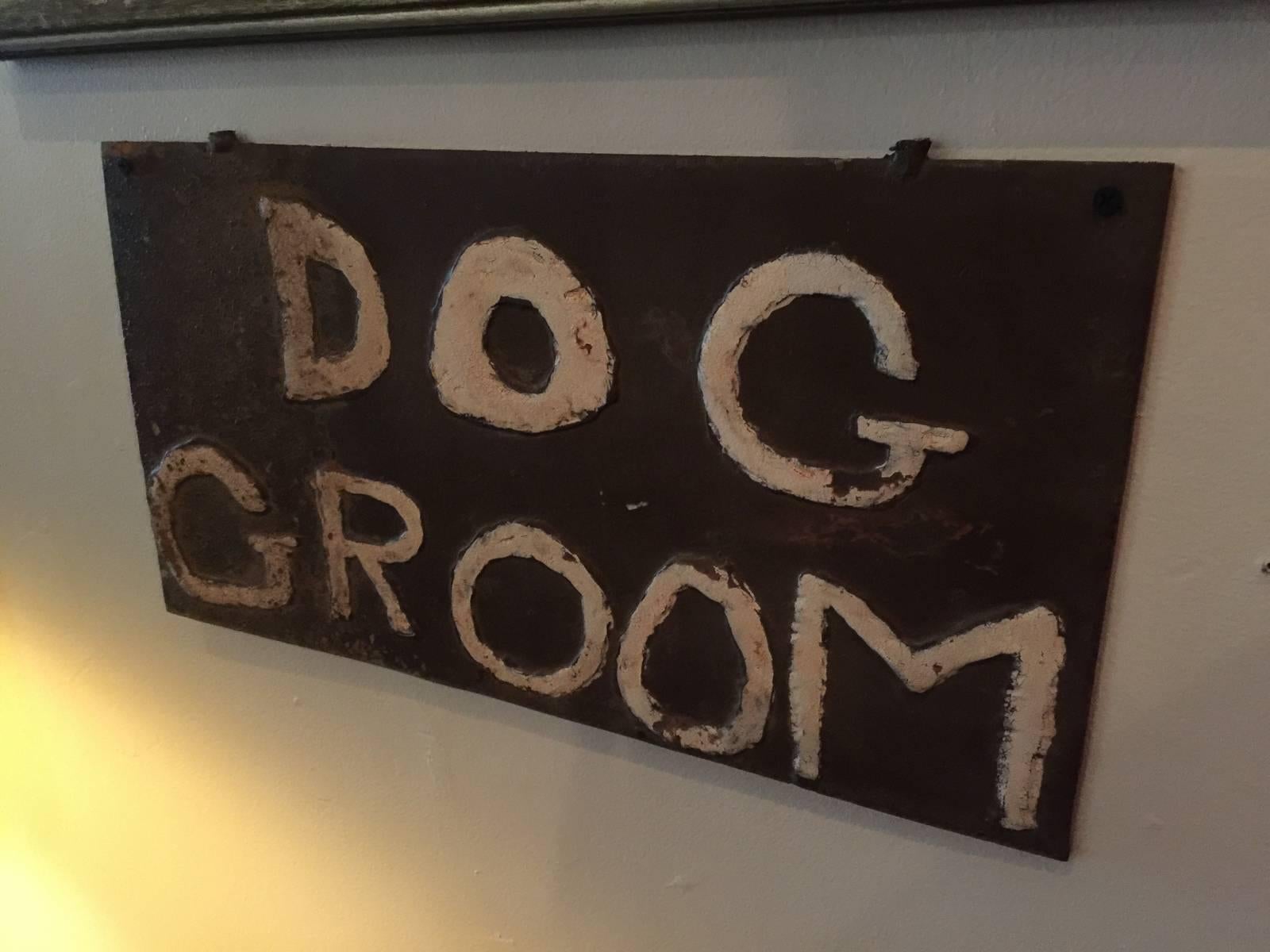 Early century double-sided steel dog grooming trade sign.