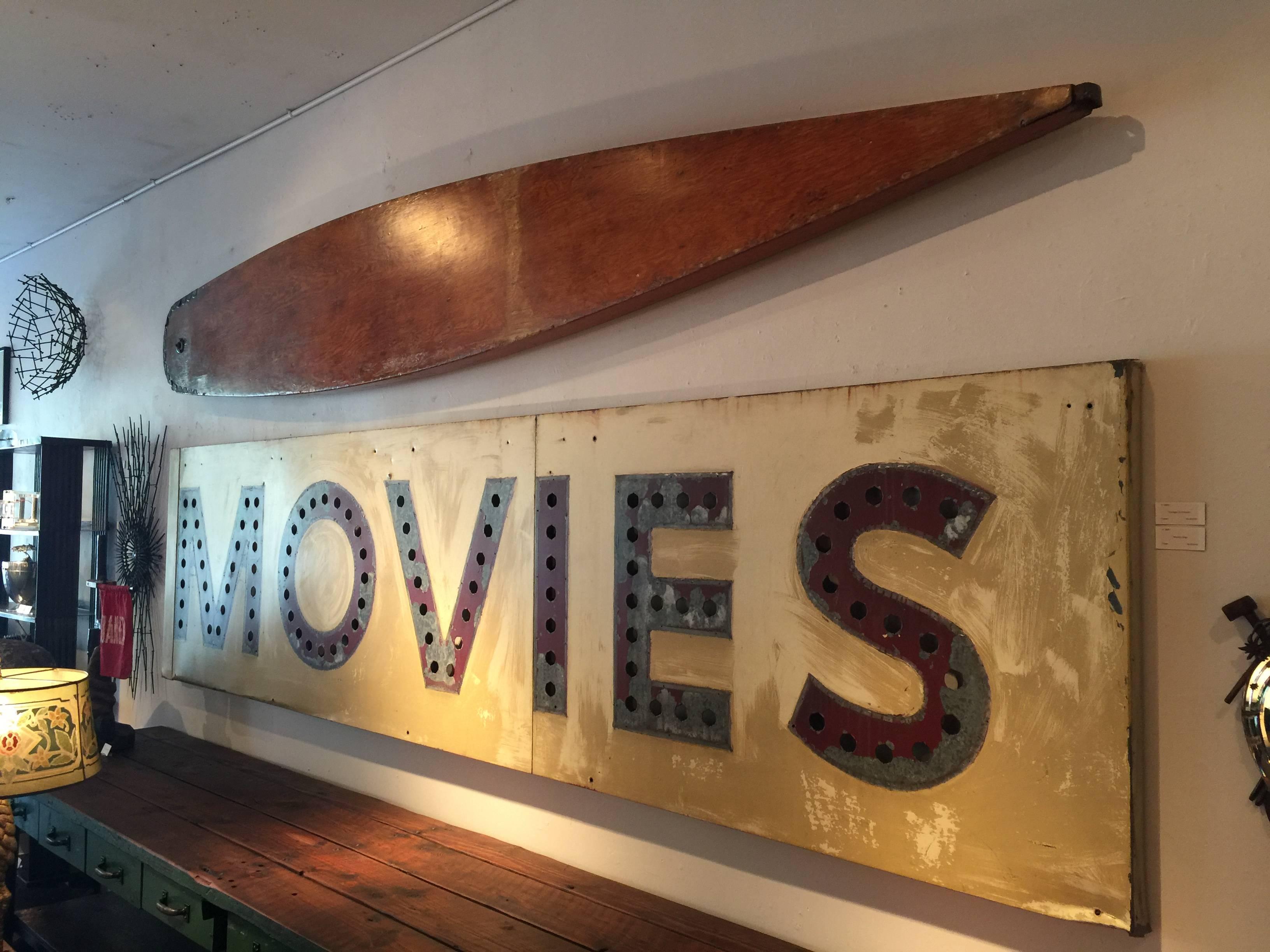 Early handmade wooden surfboard or paddle board. We've added a long French cleat for safe and secure wall presentation. This was found in an estate in LaJolla California. 

  

     