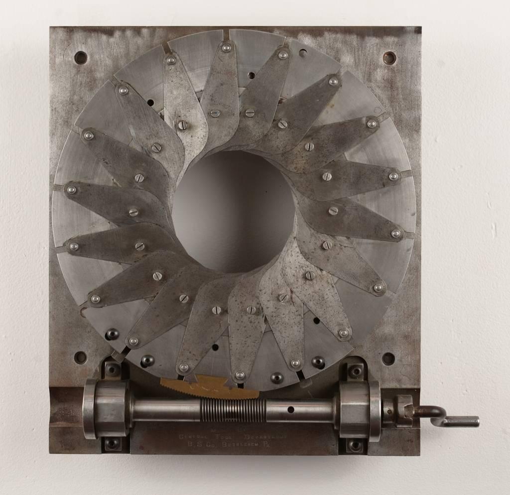 Beautifully machined steel manually operated aperture. We have added a custom-made steel cleat for an optional wall presentation. This was made by the Bethlehem steel Corporation and may have functioned as a small-scale trade or salesman sample.