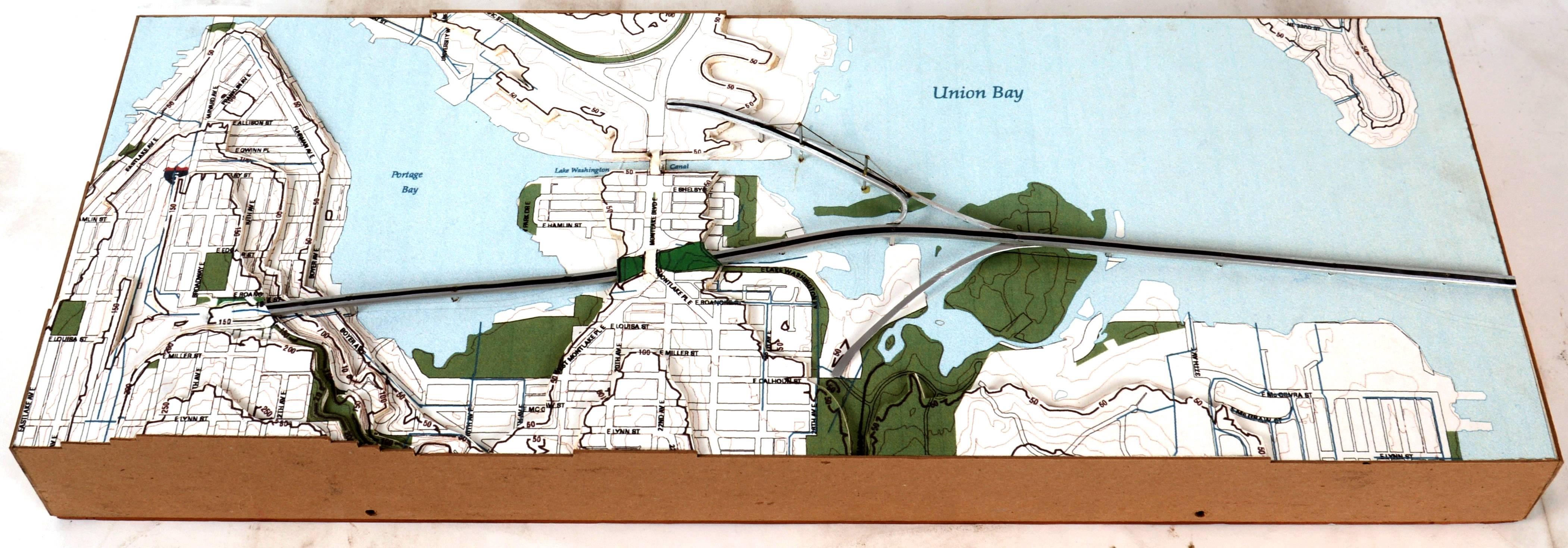Architectural map/model of a proposed suspension bridge branching off of 520 here in Seattle.