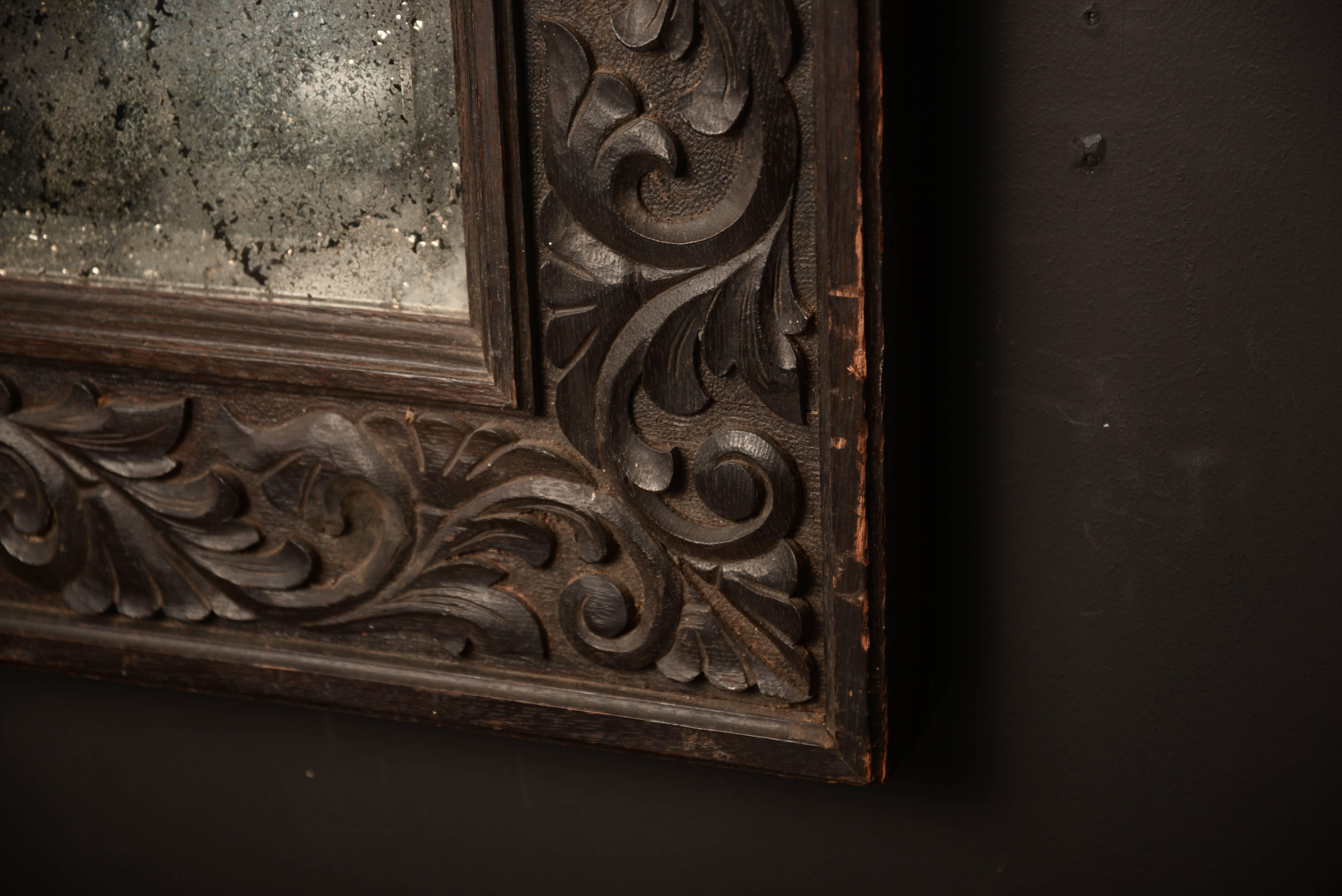 19th Century Carved Black Oak Mirror