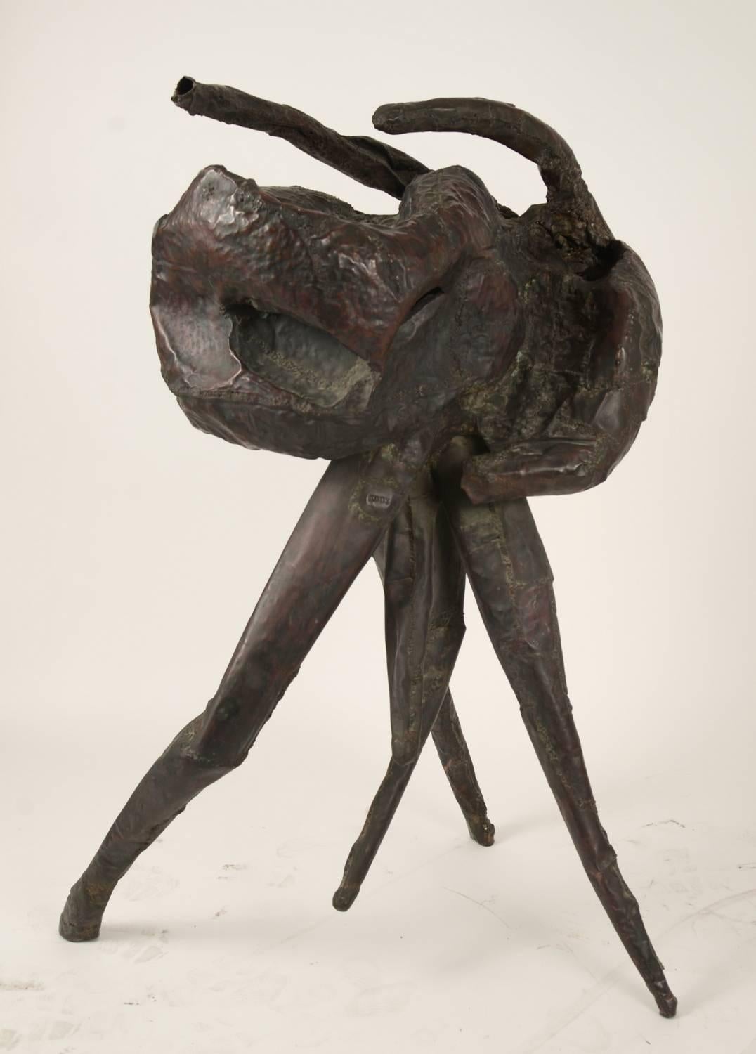 Brutalist copper sculptural figure entitled Eddy. This was found in the basement of the university of Michigan art department. The artist is unknown.

 