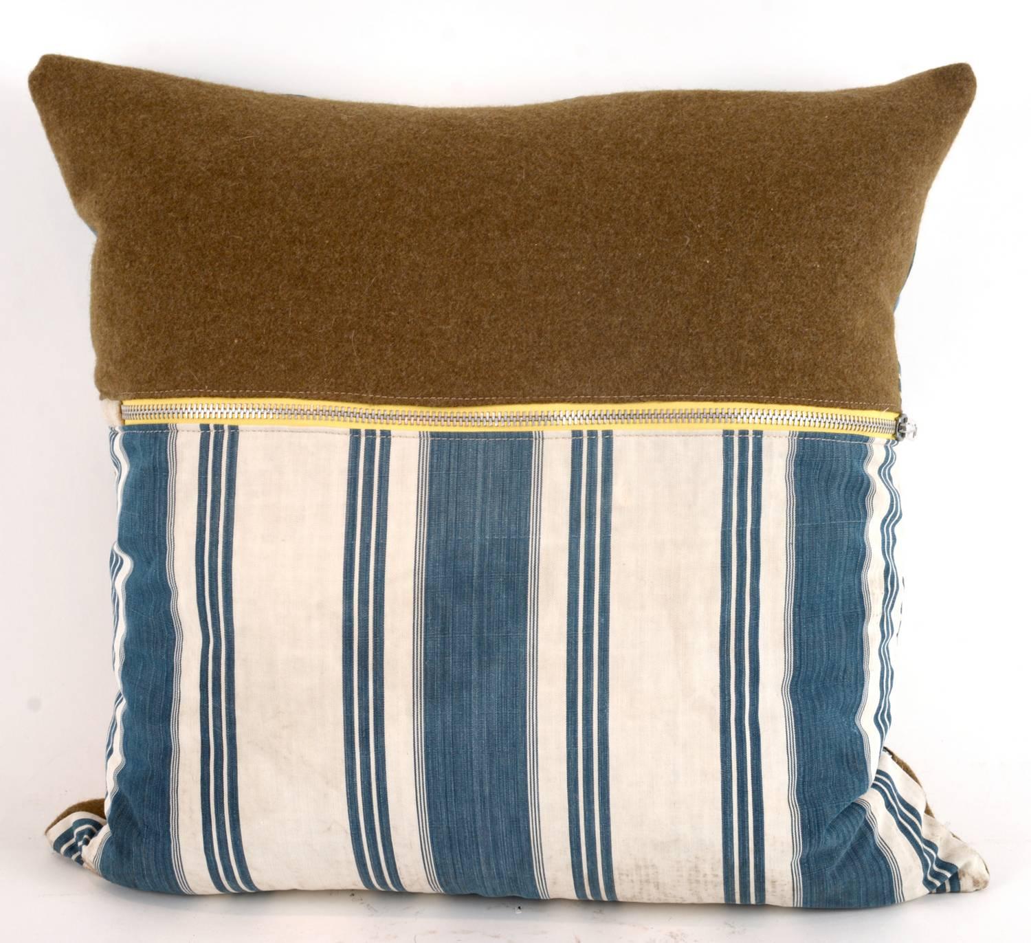 These pillows have a perfectly relaxed look including expected wear and tear to the vintage material. This is intentional and we believe it adds to the beauty and unique character of pillow.


   
