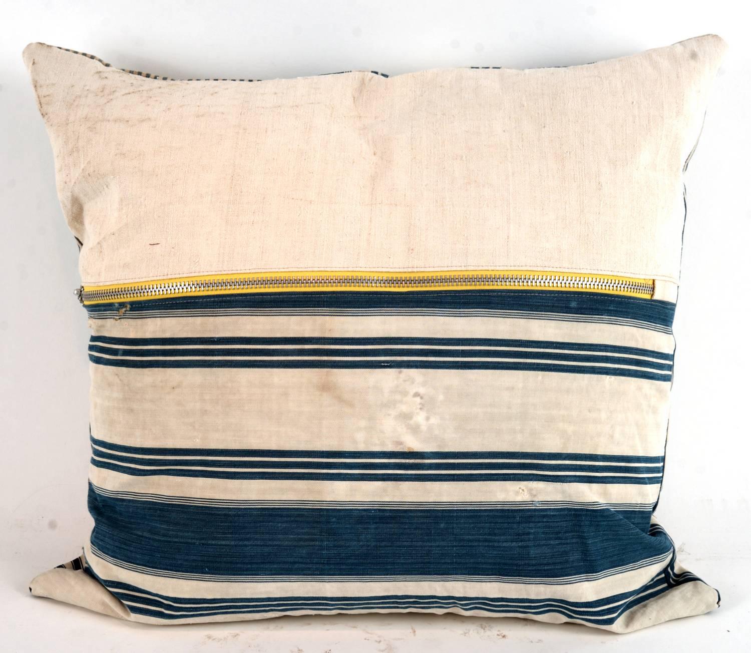 These pillows have a perfectly relaxed look including expected wear and tear to the vintage material. This is intentional and we believe it adds to the beauty and unique character of pillow .


 