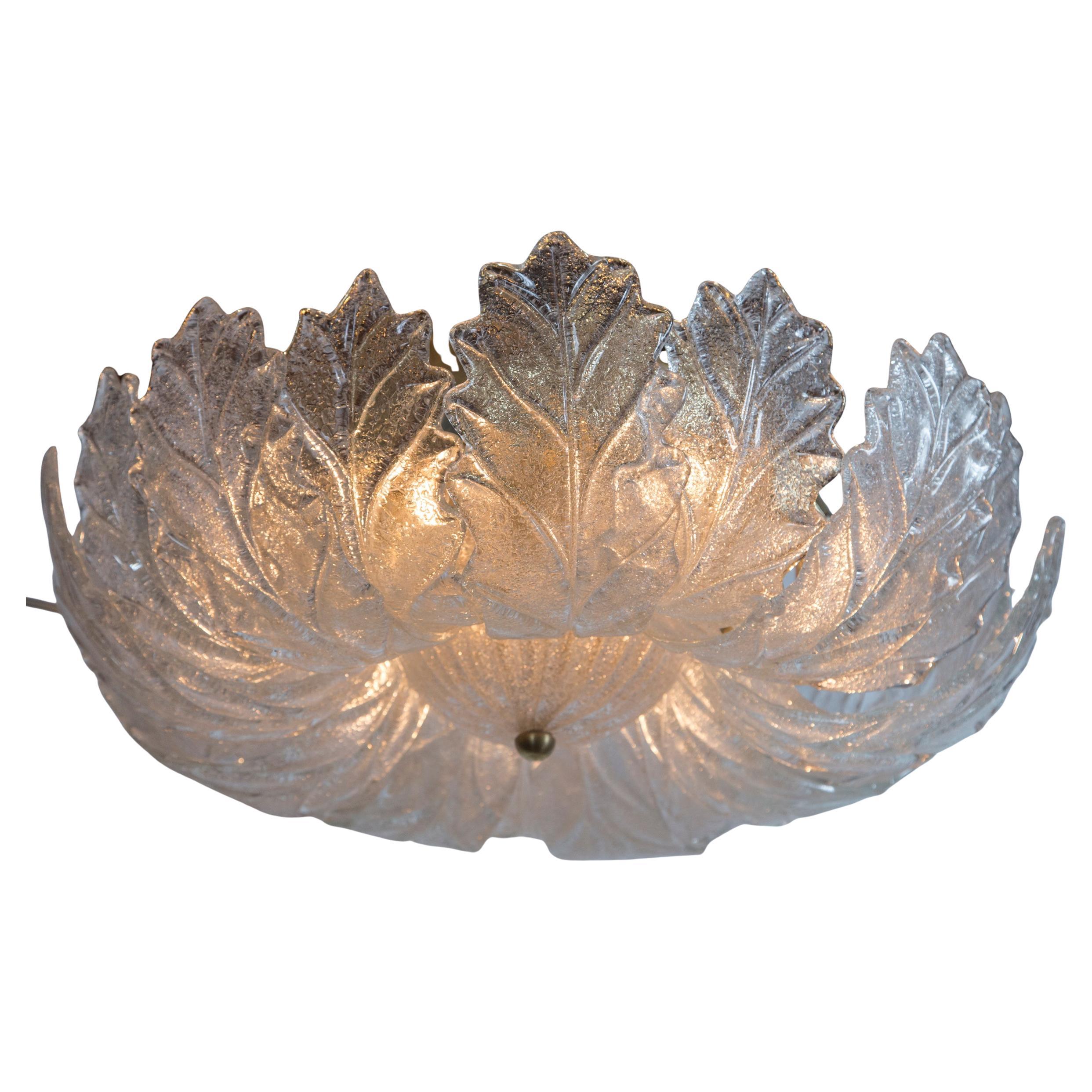  Italian frosted clear glass fixture illuminate with a warm and icy effect, composed of 18 curled leaves finishing with a center glass bowl and brass hardware, note wonderful size! Substantial light for a small size.
Illuminates with 9 candelabra