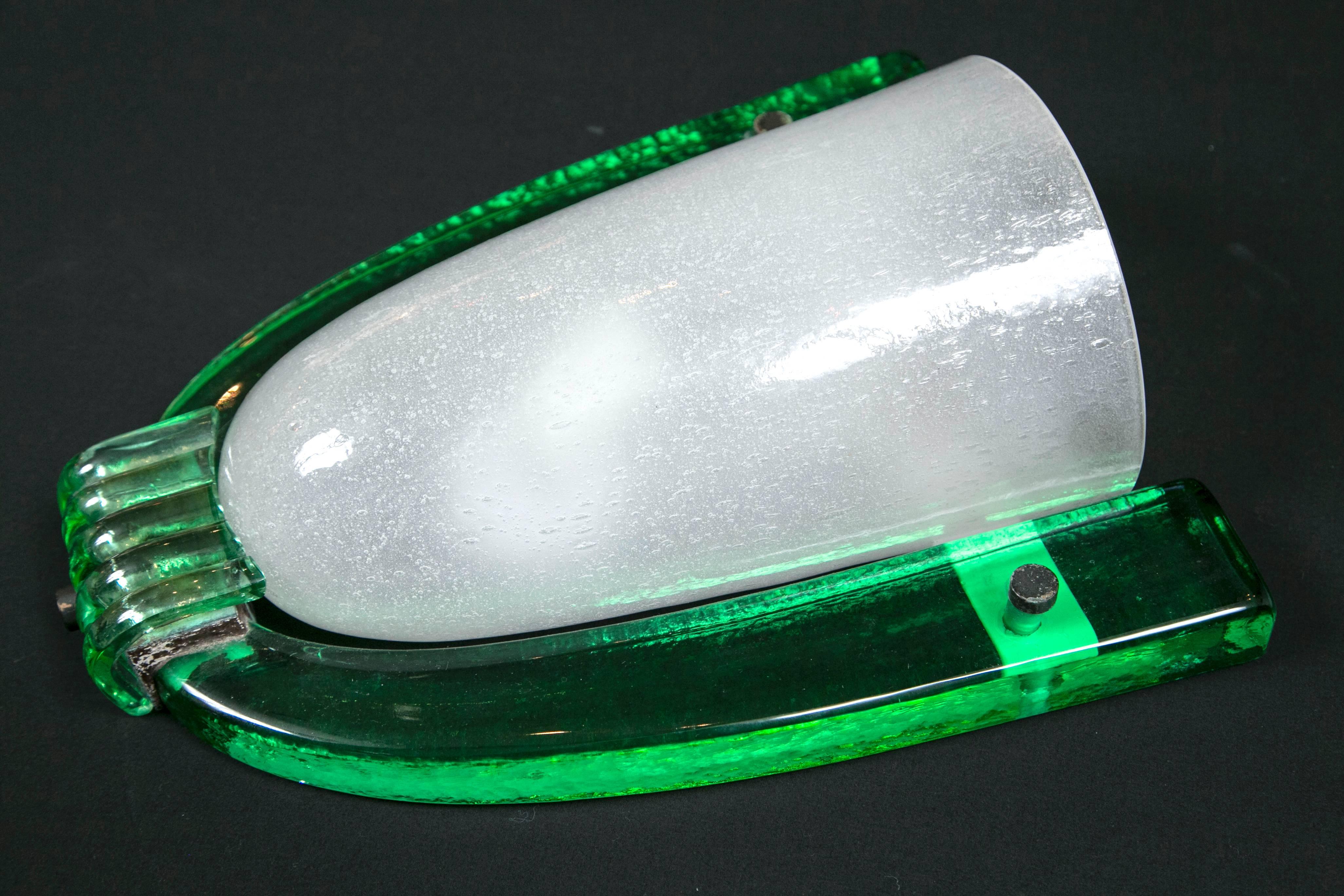 Large pair of unique wall lights blown in the puleguso technique with emerald green arms by  Seguso
priced as a pair, only a pair available.  This model was re-issued from a 1940's model
    