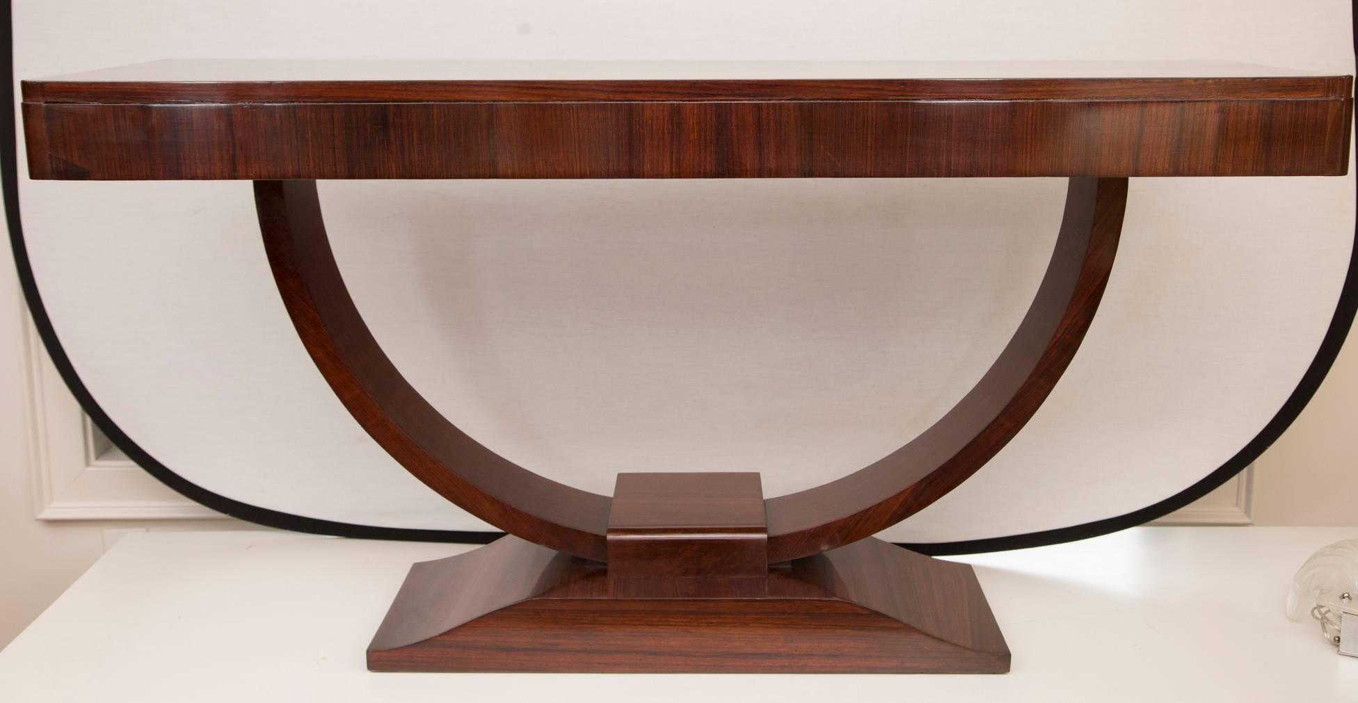 Fine pair of rosewood veneer tulip-shaped console table, recently refurbished and French polished, France, circa 1930.
 