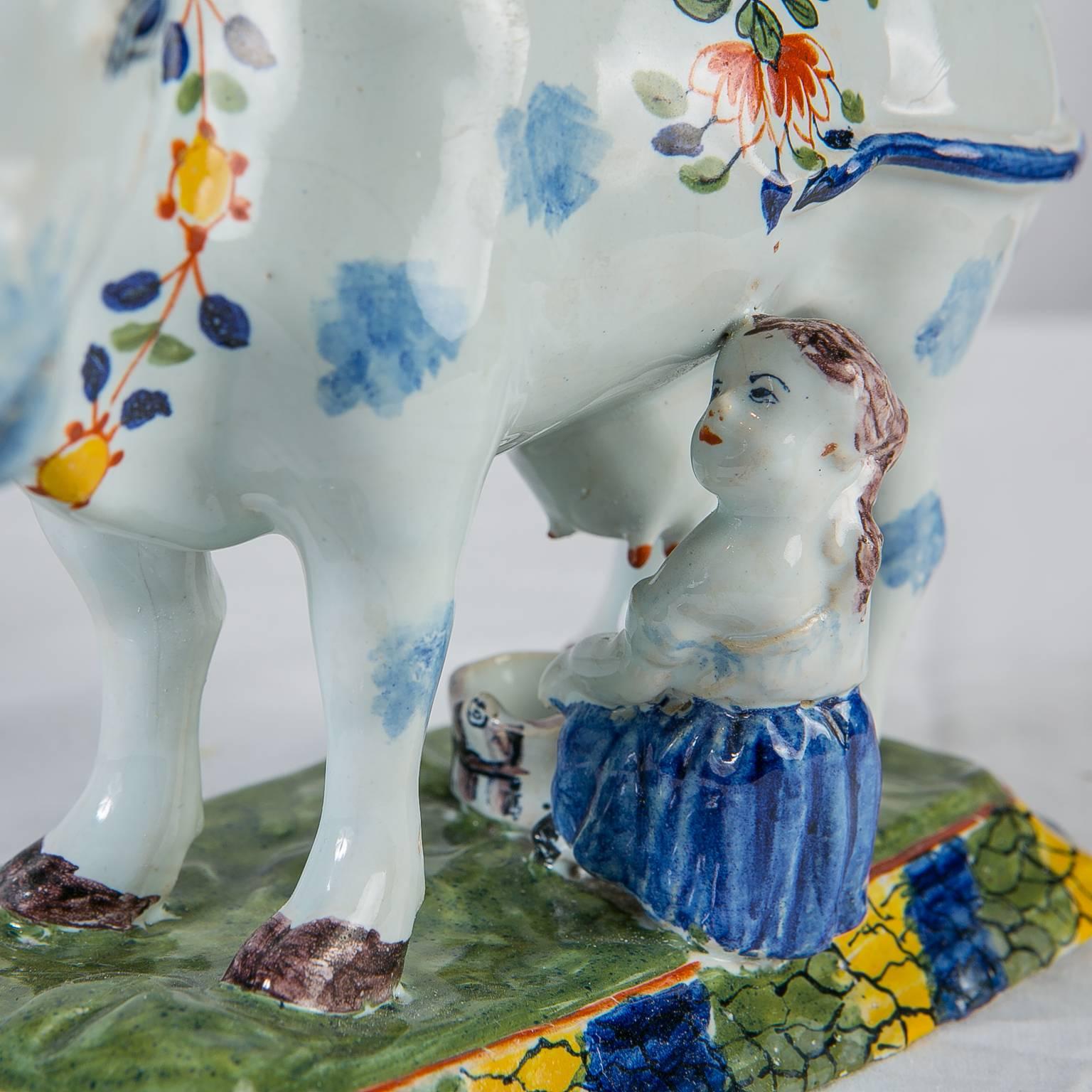 Hand-Painted Pair of Dutch Delft Cows Painted in Bright Polychrome Colors