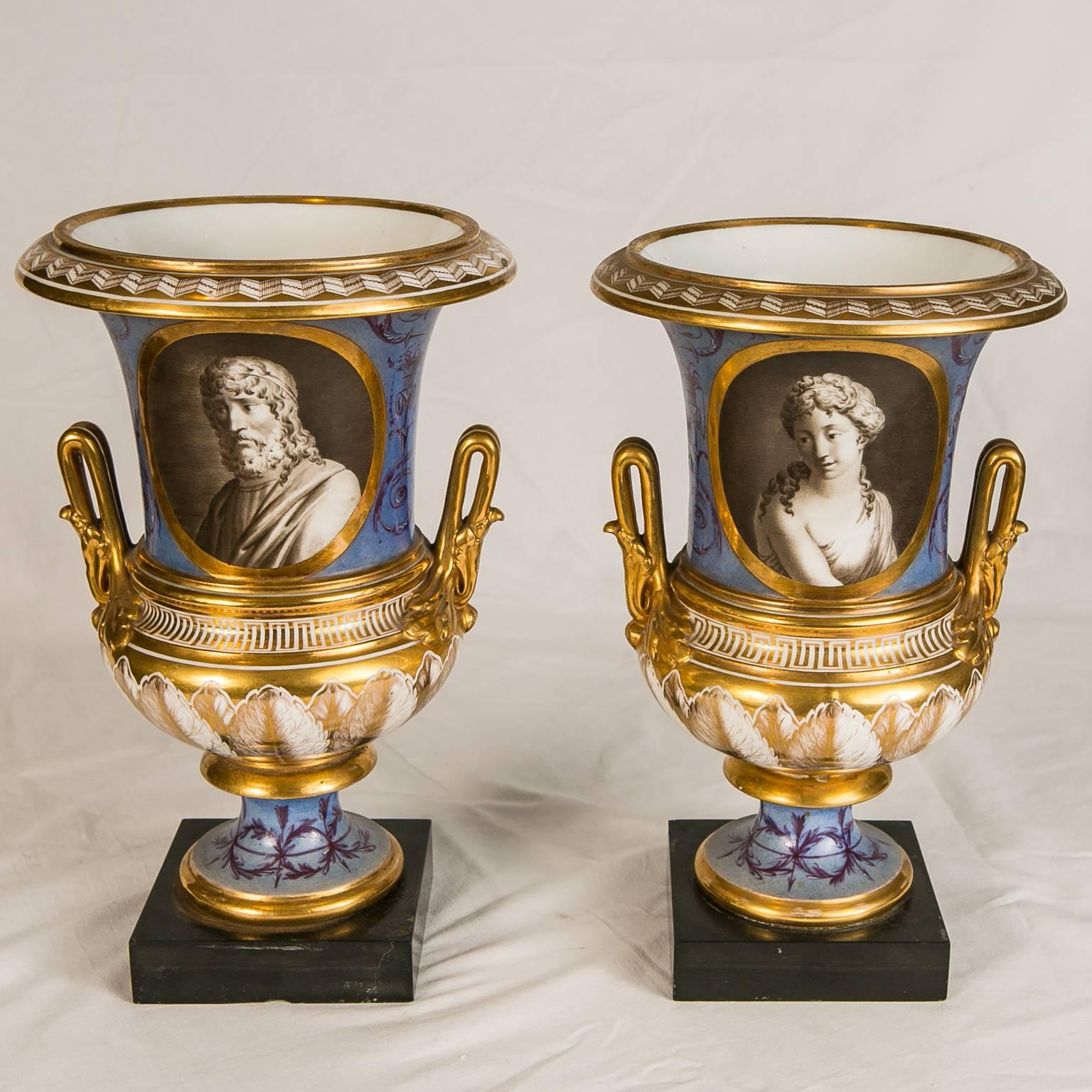 This pair of neoclassical portrait vases were made in early 19th century France. The exquisite execution of the classical portraits is immediately appealing. They connect with the viewer as if they were alive. Painted in grisaille and framed in