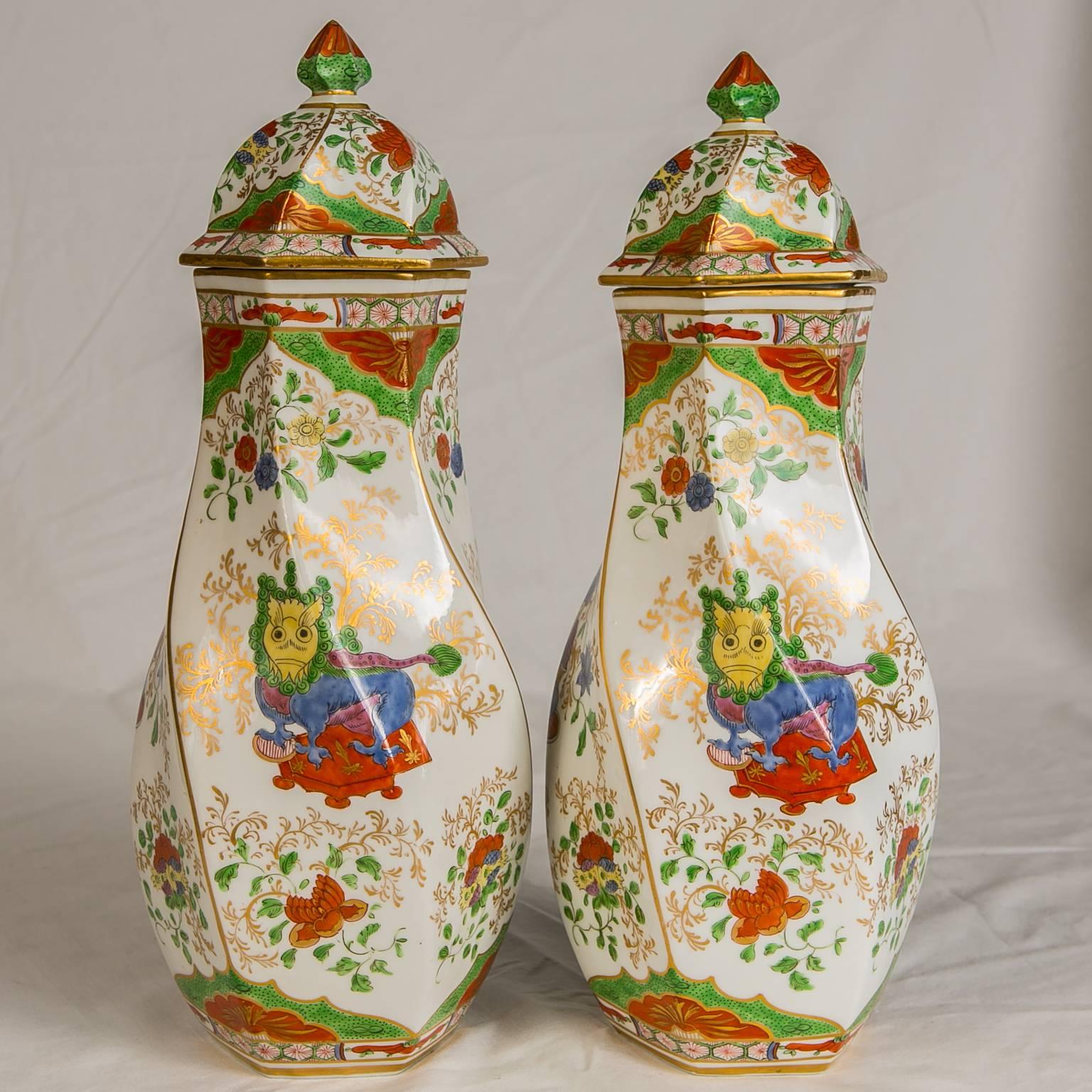 This is a rare pair of hexagonal vases decorated with a very popular pattern known as Bengal Tiger, also known as Dragon in Compartments, and Kylin in Compartments. It is an exotic pattern originally made on 18th century Chinese export porcelains.