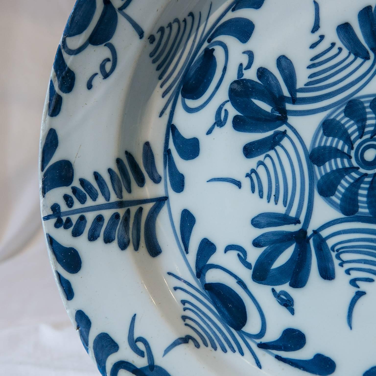 We are pleased to offer this exceptional 18th century Delft charger painted in a crisp, bold, geometric pattern. Made in England circa 1760 this energetic Blue and White design indicates that the charger was likely made in the Lambeth High Street