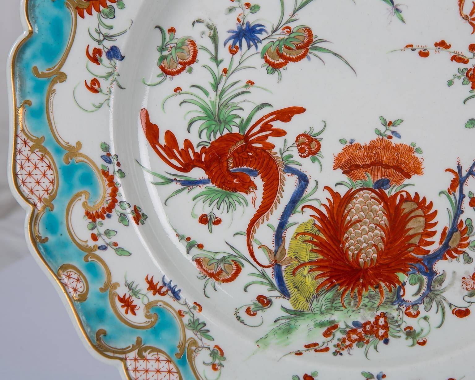 The rare Jabberwocky pattern was created by Worcester Porcelain in the 18th century. This pair, made circa 1765, are hand-painted in turquoise, and iron-red, with accents of blue and green. The dishes show two exotic dragons in flight, flowering
