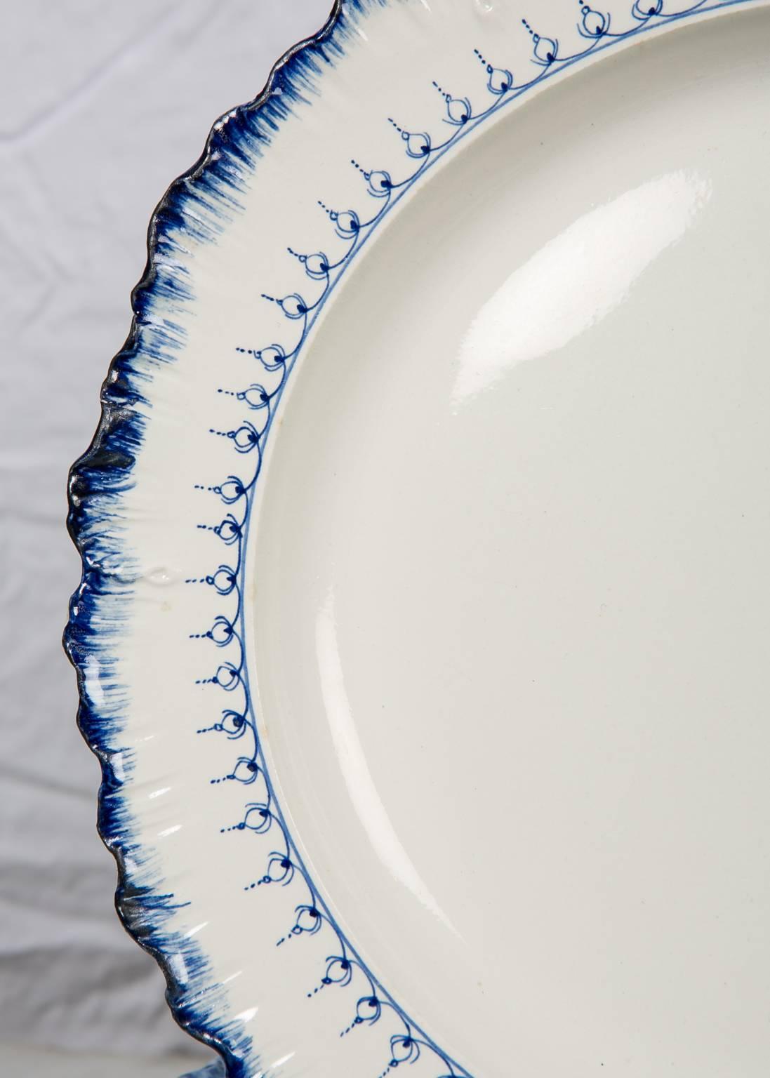 white and blue antique dishes