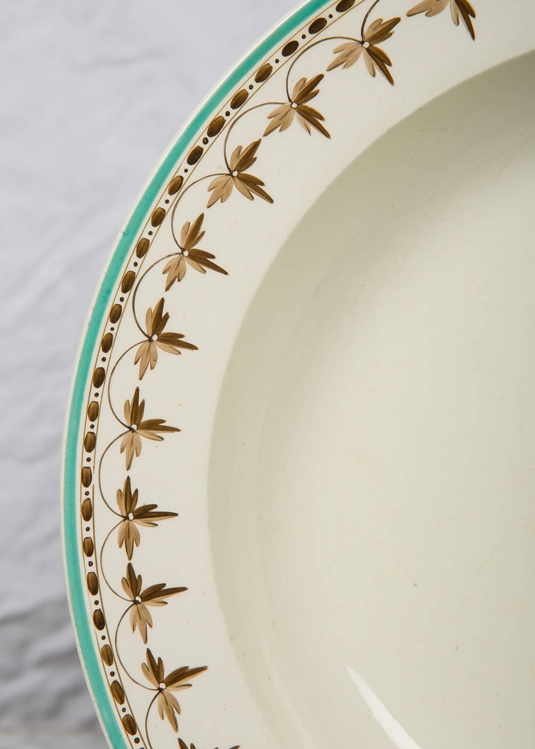 We are pleased to offer this set of eleven Wedgwood 18th century creamware soup dishes the borders decorated with a beautiful brown necklace design, highlighted by a lively turquoise painted edge.
The dishes measure 9.75 inches diameter.
The