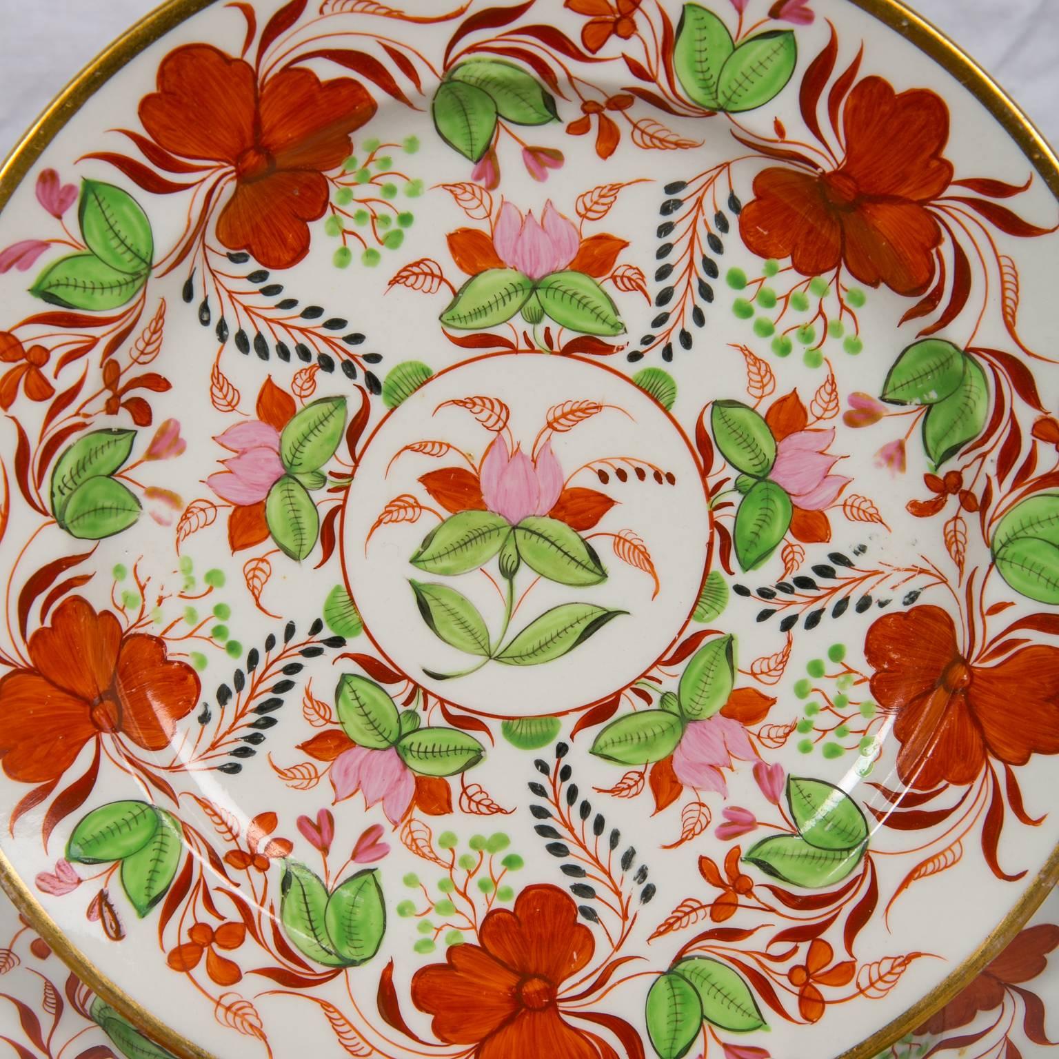 A dessert service in Masons Porcelain is an extraordinary set of dessert dishes in a lively, vibrant overall pattern of pink and orange flowers and green leaves. Like many of Miles Mason's best patterns this pattern has flair. This is a pattern that