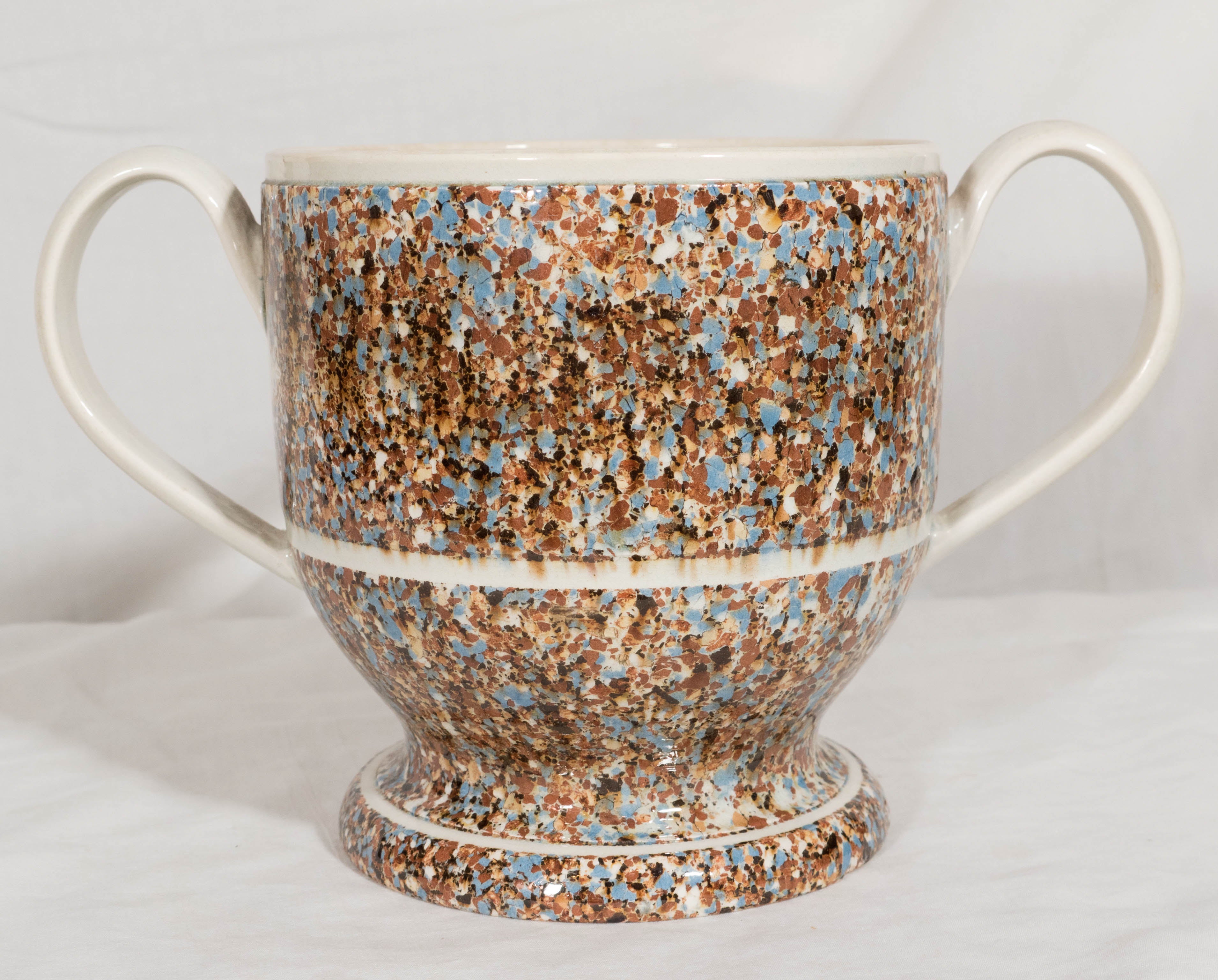 A Mocha Ware Slip Agateware Loving Cup