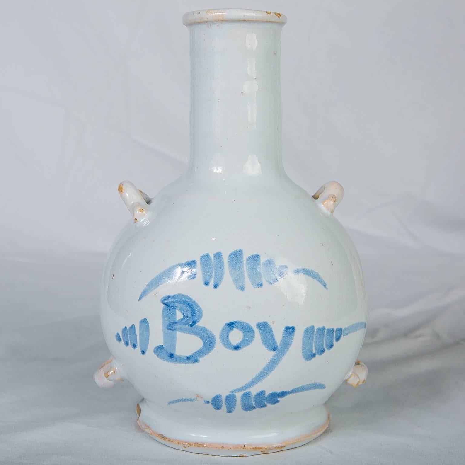 Painted in underglaze blue with the word 