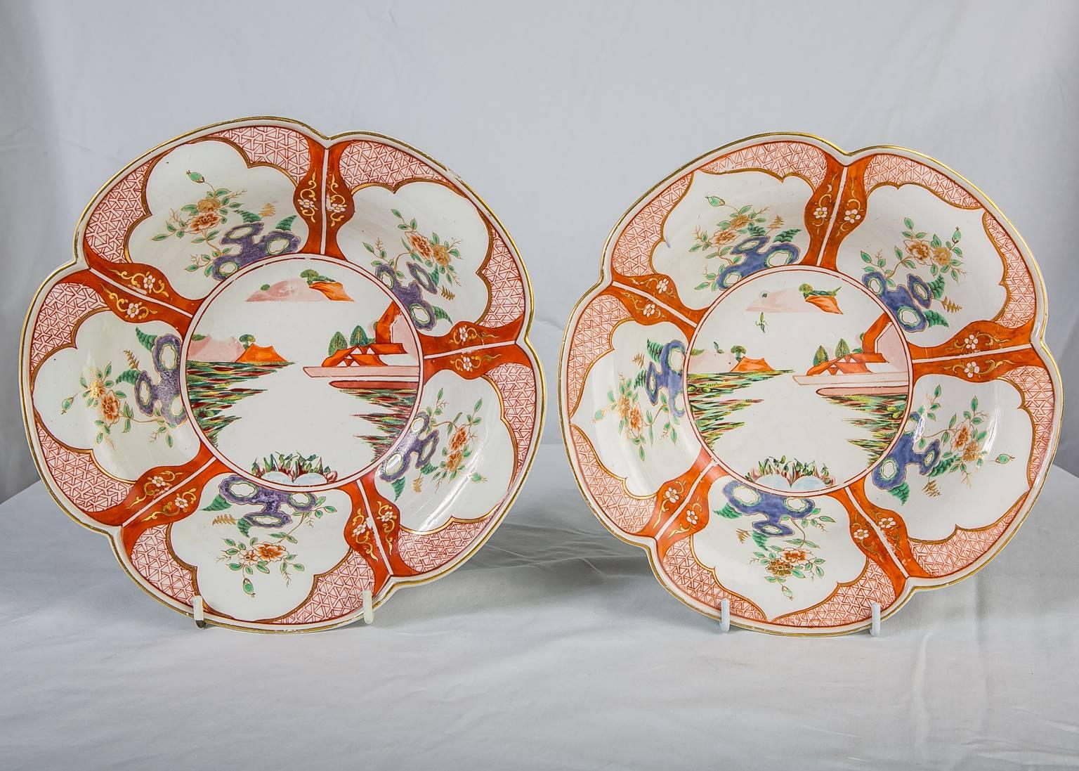  This rare and exquisite pair of hand-painted porcelain bowls were made by Derby Porcelain in mid-18th century England, circa 1765. This was only ten years after the start of the Derby factory under the control of William Duesbury. 
The shaped bowls
