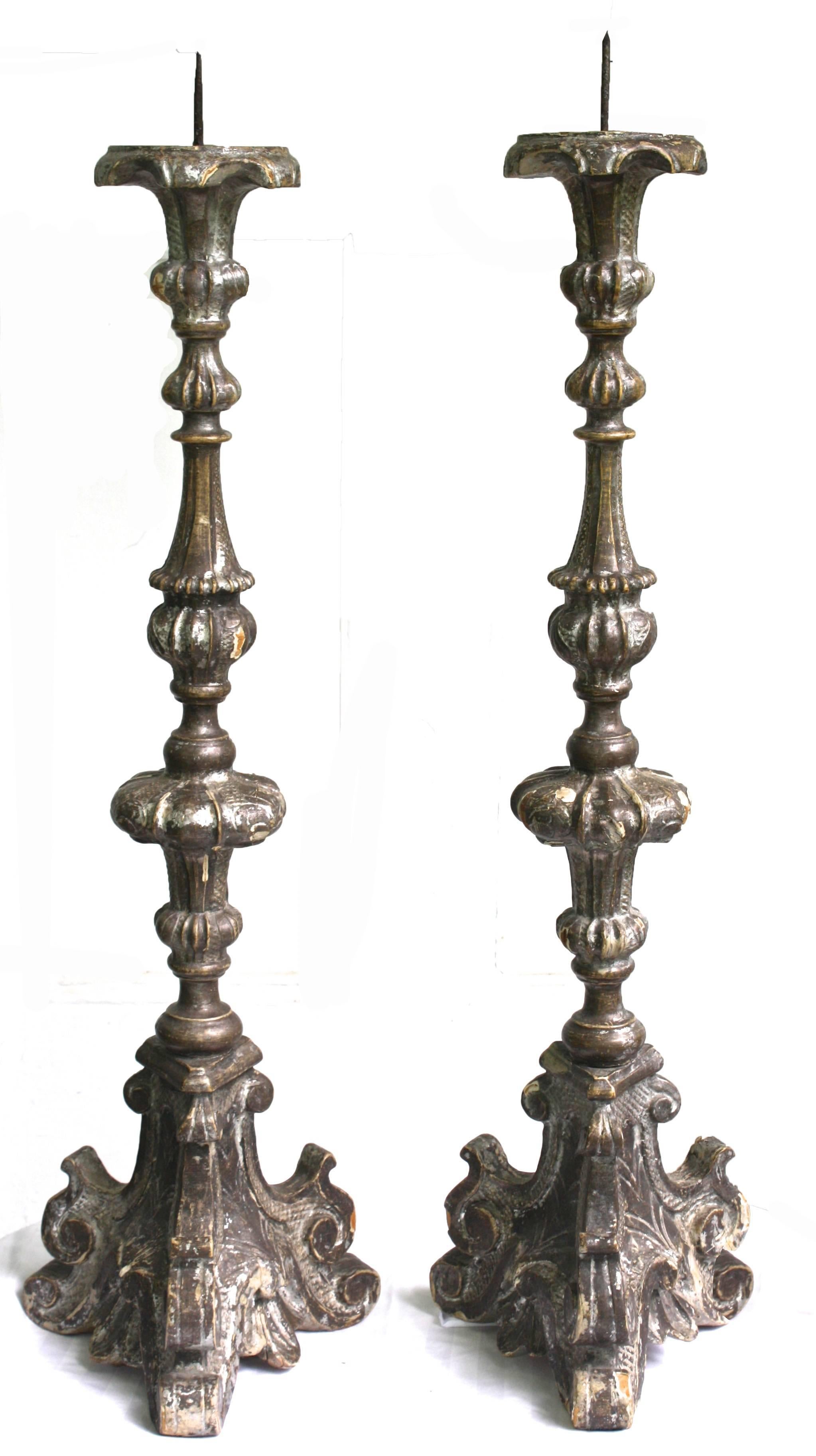 As closely matched as a hand-carved pair should be, these two appear to be of Florentine ecclesiastical origin and are proportionately sized for altar or tabletop placement.  Out of respect for age now approaching three hundred years, this 'period'