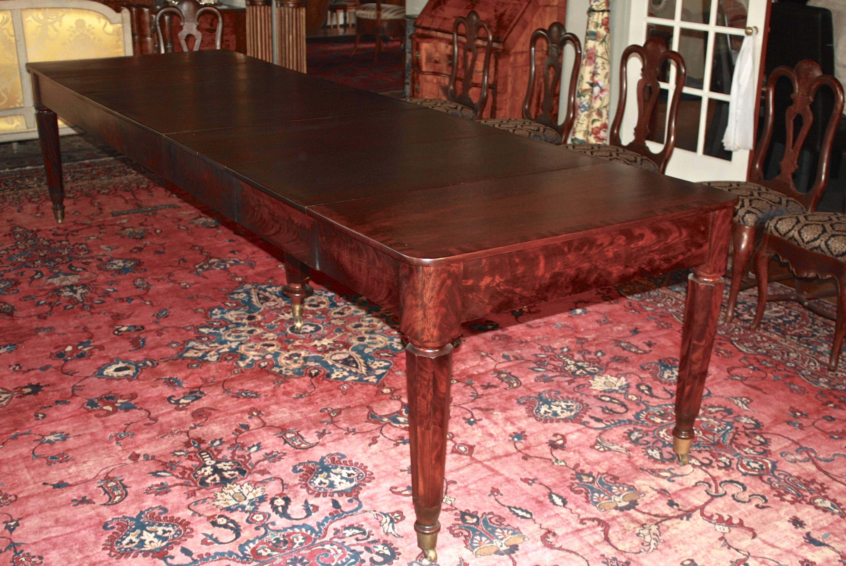 A 'bespoke' American banquet table from one of the Middle Atlantic states leading makers. A tour de force display of strikingly grained Honduran mahogany and walnut solids, veneers and contrasting bands; with beech as a secondary wood. Fully