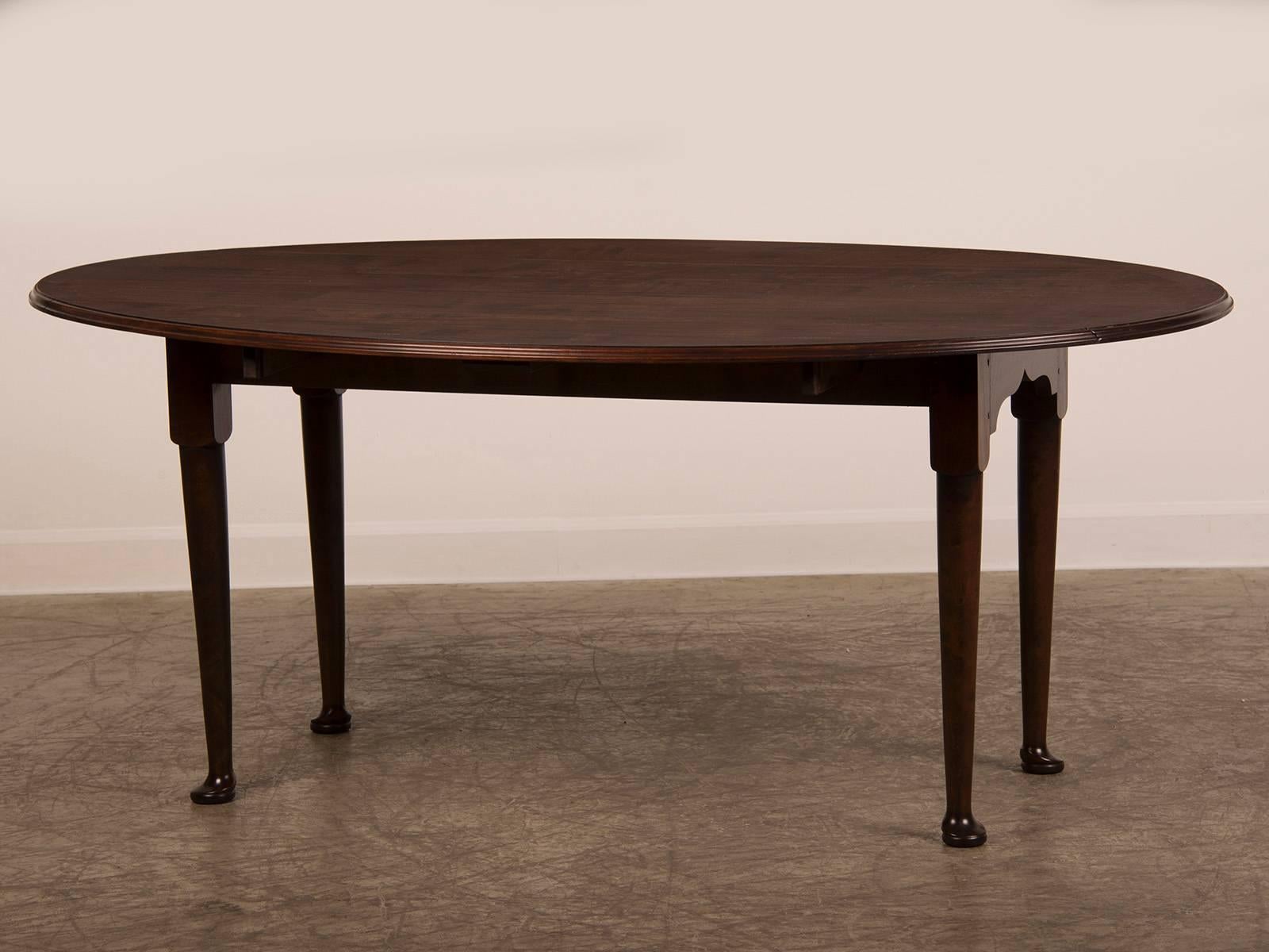 Receive our new selections direct from 1stdibs by email each week. Please click Follow Dealer below and see them first!

A 4' x 6' bespoke handmade oval cherrywood drop-leaf dining table cross-banded with mahogany resting on pad feet from Great