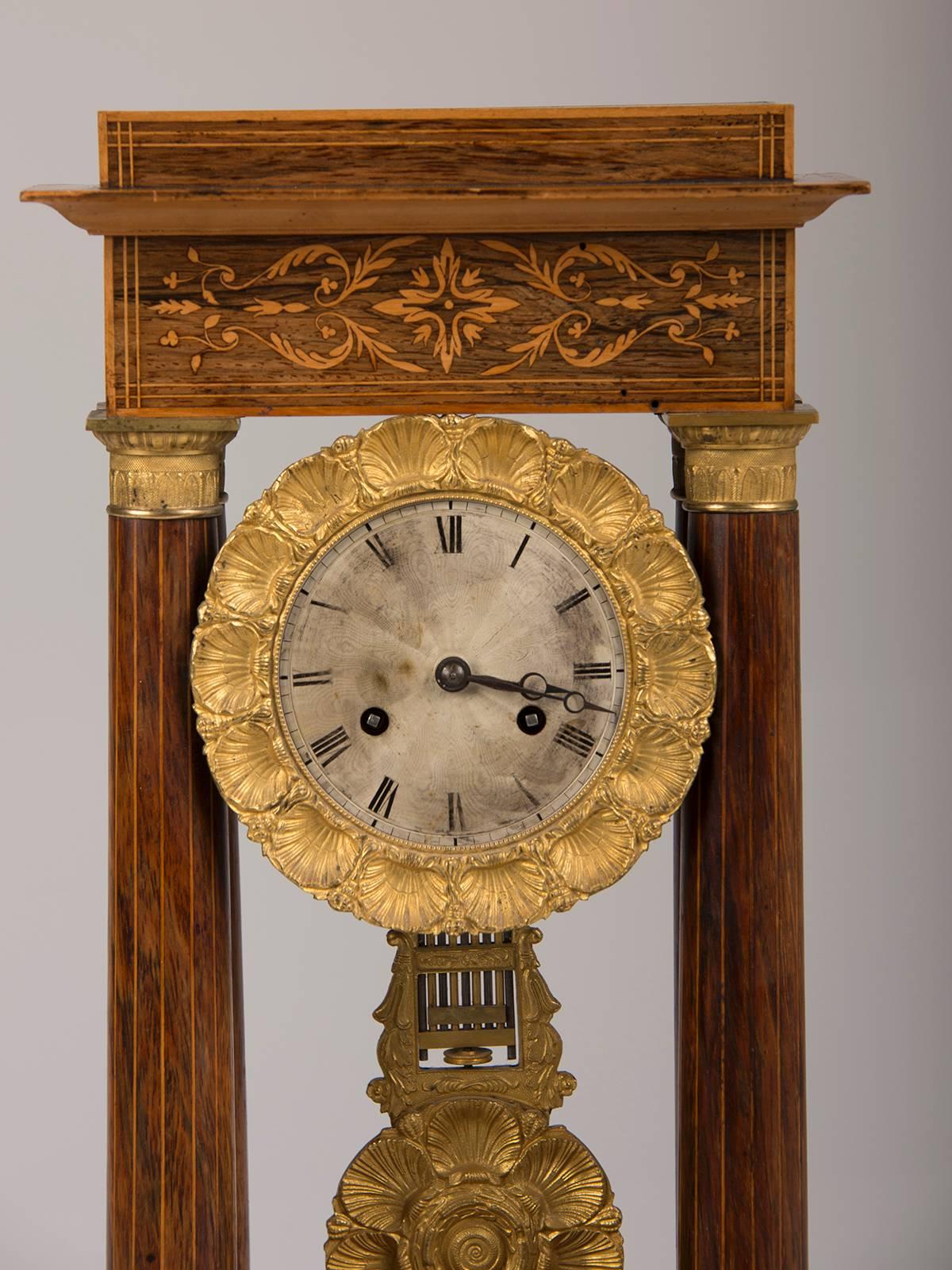 Receive our new selections direct from 1stdibs by email each week. Please click Follow Dealer below and see them first!

Louis Philippe period rosewood, ormolu Portico Clock, France, circa 1840. The attractive pale colour of the rosewood on this