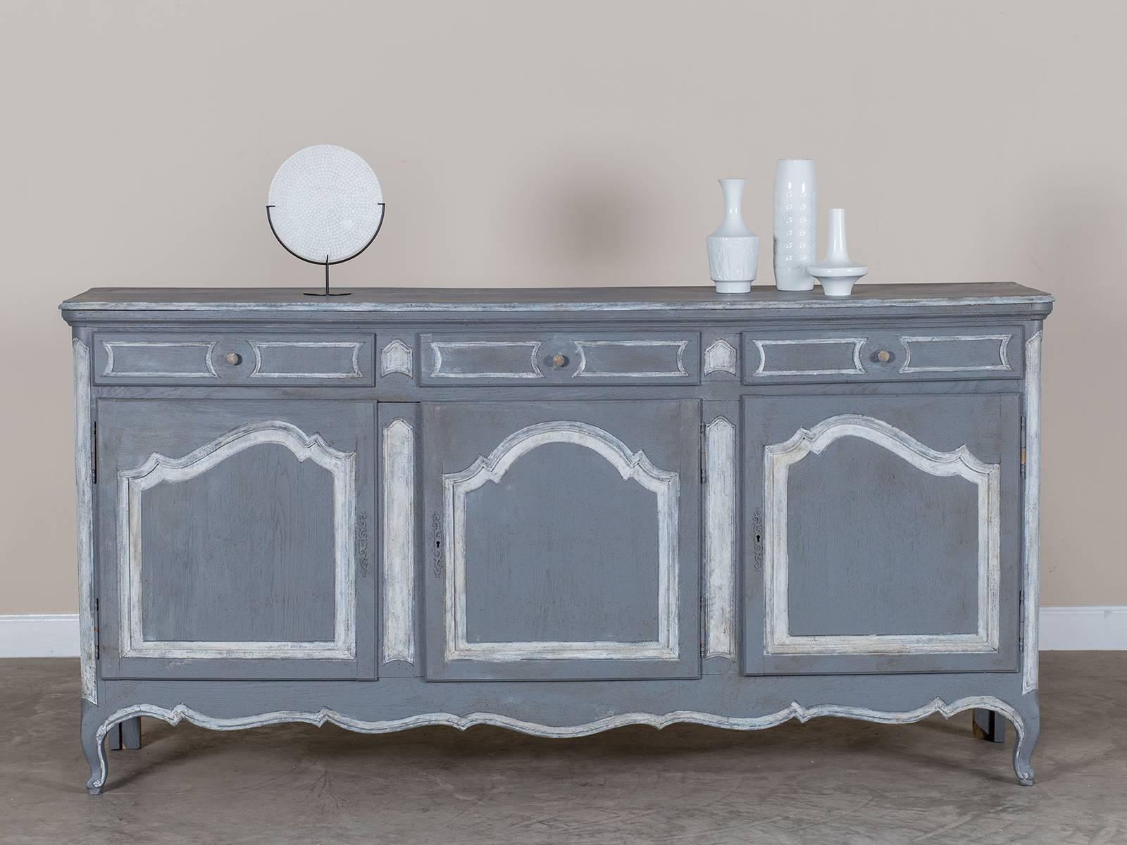 Receive our new selections direct from 1stdibs by email each week. Please click Follow Dealer below and see them first!

This handsome antique French oak buffet circa 1875 features a wonderful painted finish applied to take advantage of the