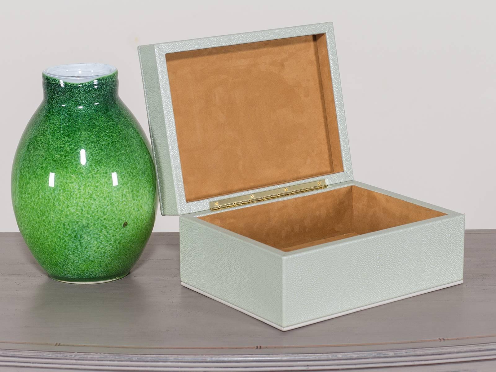 The marvelous texture of shagreen is shown here to great effect as the top and all sides of the box are sheathed in this rare and luxurious material. A favorite of Art Deco designers the unique texture of shagreen results from its origin as the skin