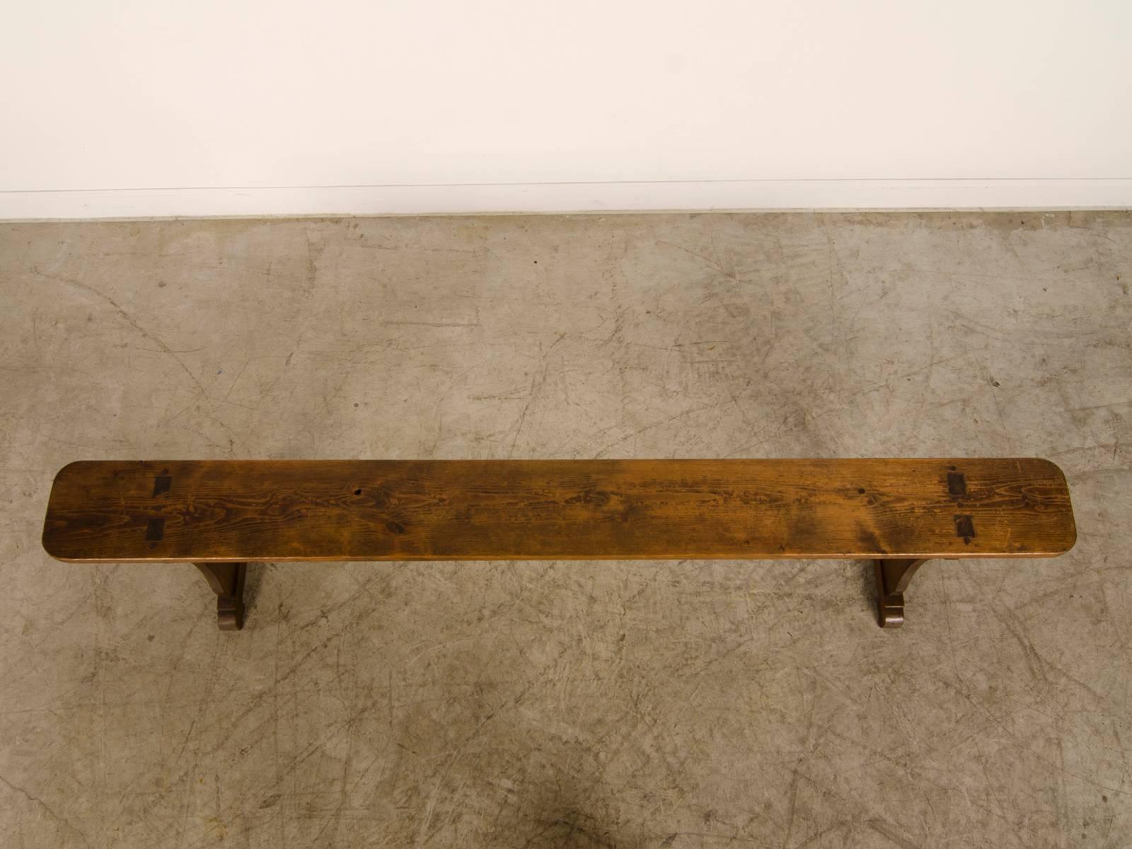 Receive our new selections direct from 1stdibs by email each week. Please click Follow Dealer below and see them first!

Long pine bench from England circa 1840 with a shallow depth. This handsome bench has a top cut from a single tall tree that