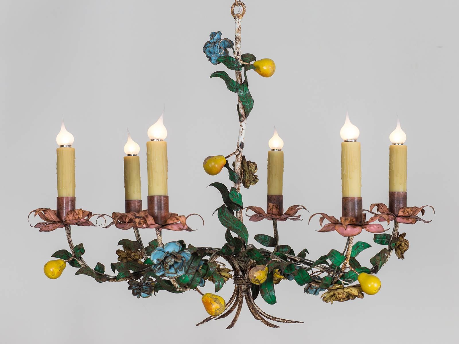 Receive our new selections direct from 1stdibs by email each week. Please click Follow Dealer below and see them first!

The immense charm of the fruit and flowers on this vintage Italian tôle chandelier circa 1920 is marvelous to see. The