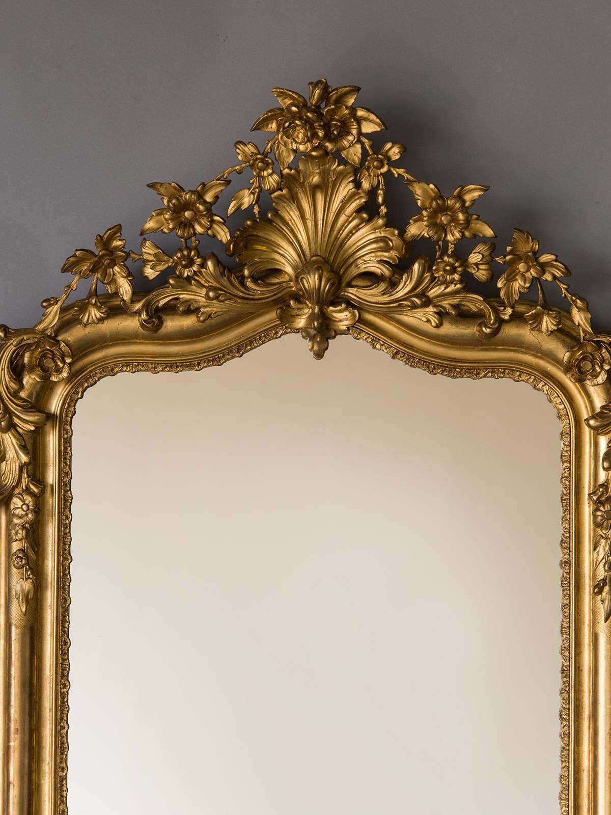 Receive our new selections direct from 1stdibs by email each week. Please click Follow Dealer below and see them first!

The superb decoration on this antique French, circa 1880 mirror is quite exceptional. The lavish cartouche at the top has a