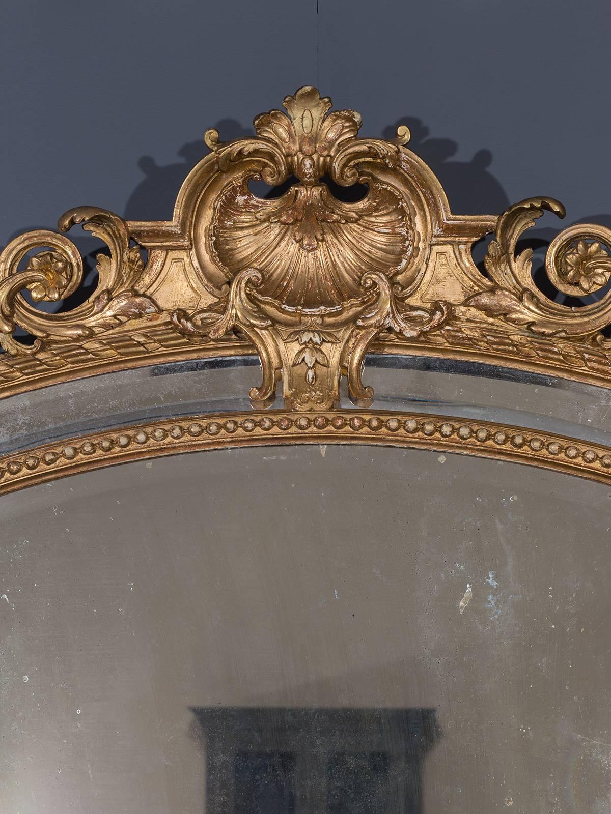 Receive our new selections direct from 1stdibs by email each week. Please click Follow Dealer below and see them first!

The elegant profile of this antique French mirror lies in the tall and slender proportions that immediately draw the eye to