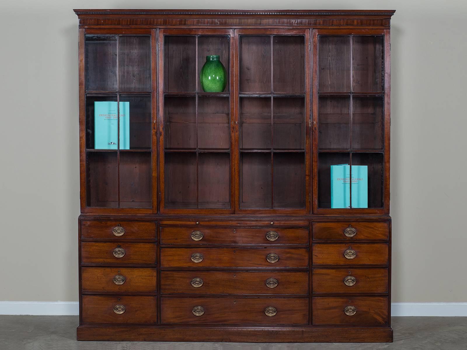 Receive our new selections direct from 1stdibs by email each week. Please click Follow Dealer below and see them first!

This is a unique piece of antique English cabinetry, circa 1780 for several reasons. The upper section has four rectangular