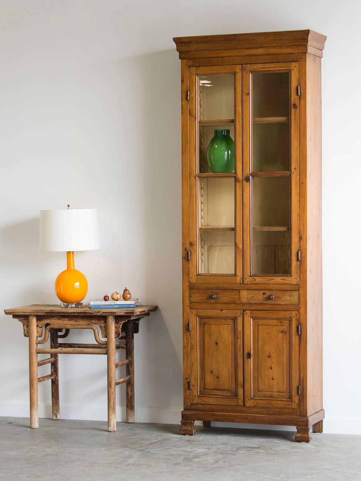 Receive our new selections direct from 1stdibs by email each week. Please click Follow Dealer below and see them first!

An exceptionally tall and slender French Louis Philippe period pine bookcase, circa 1850. One of the most impressive aspects