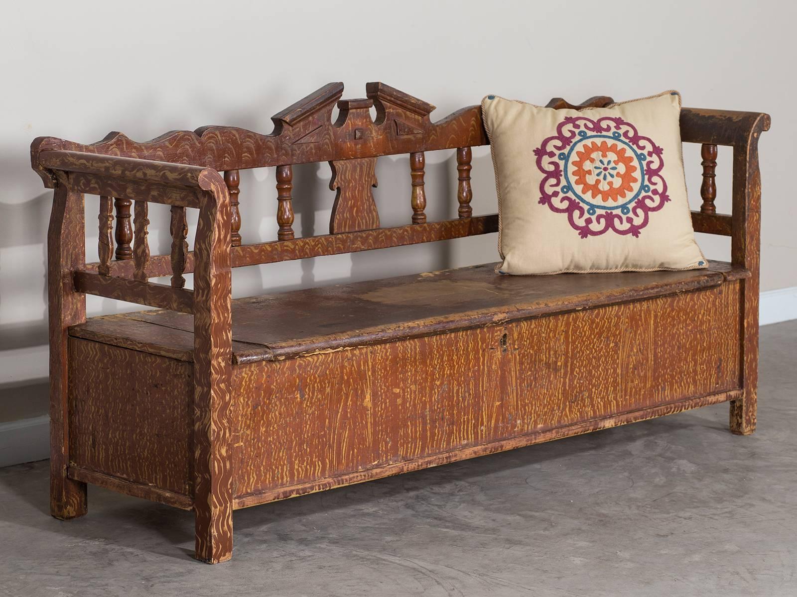 Receive our new selections direct from 1stdibs by email each week. Please click Follow Dealer below and see them first!

The lovely symmetry and hand-painted faux finish on this antique Romanian Hungarian bench, circa 1875 remains as handsome