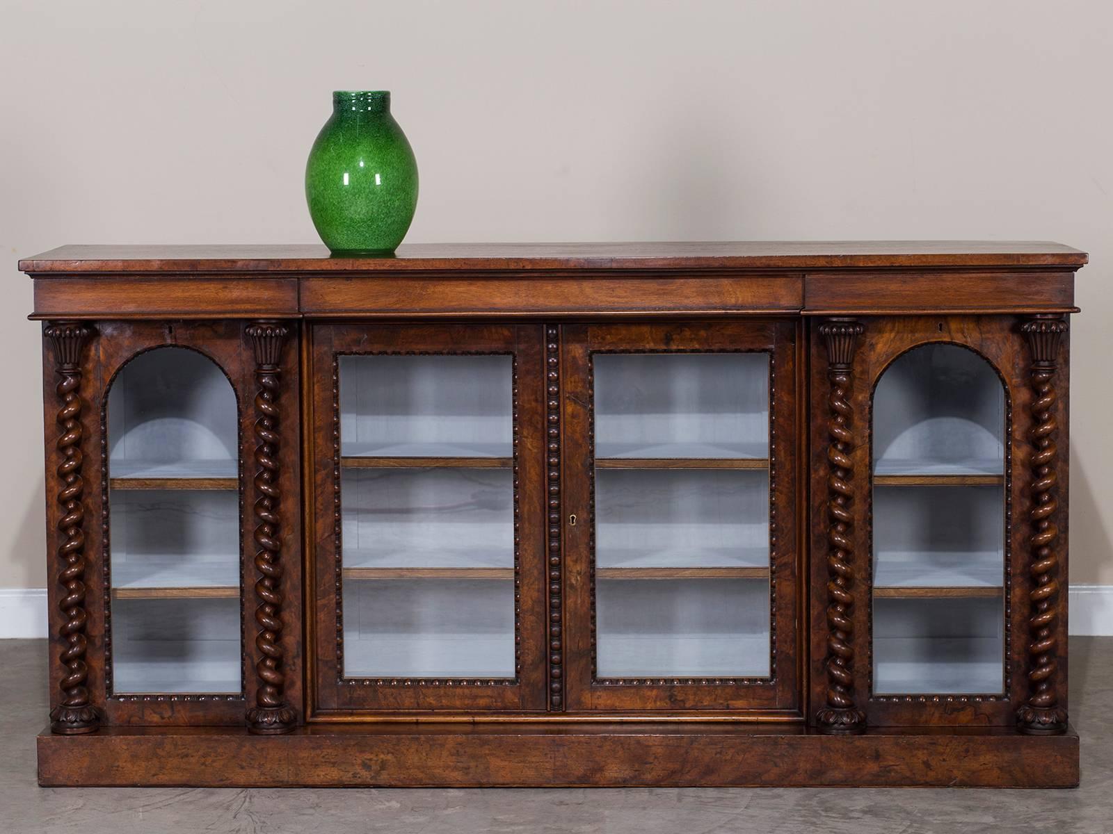 Receive our new selections direct from 1stdibs by email each week. Please click Follow Dealer below and see them first!

The elegant spiral of the barley twist columns add a striking impression to this antique English display cabinet bookcase,