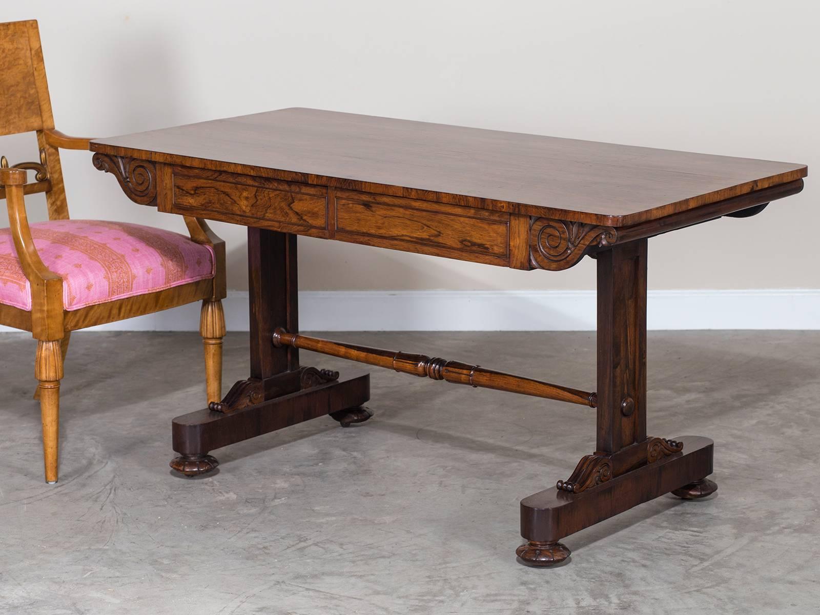 Receive our new selections direct from 1stdibs by email each week. Please click Follow Dealer below and see them first!

The restrained and elegant profile of this antique English rosewood writing or library table circa 1835 gives it a stylishness