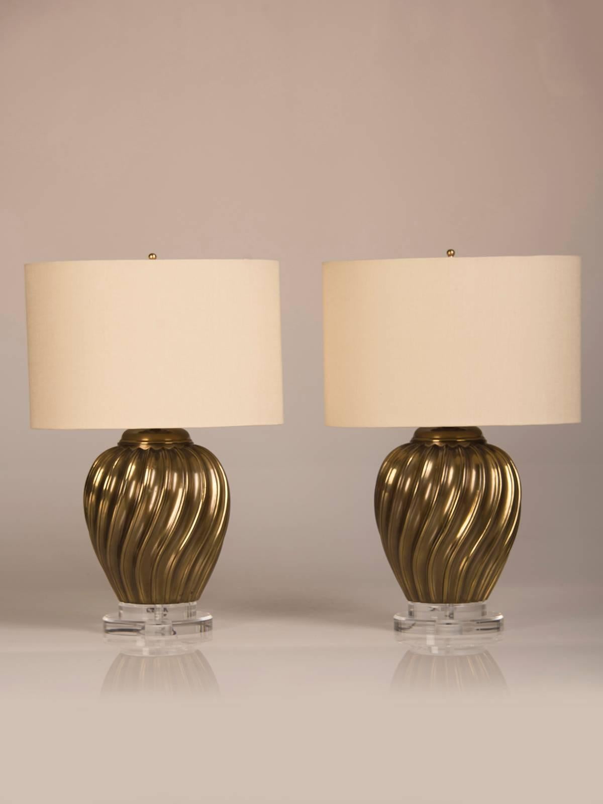 Receive our new selections direct from 1stdibs by email each week. Please click Follow Dealer below and see them first!

A pair of vintage Italian brass swirl vases now mounted as lamps circa 1950. The combination of the lustrous gleam of the