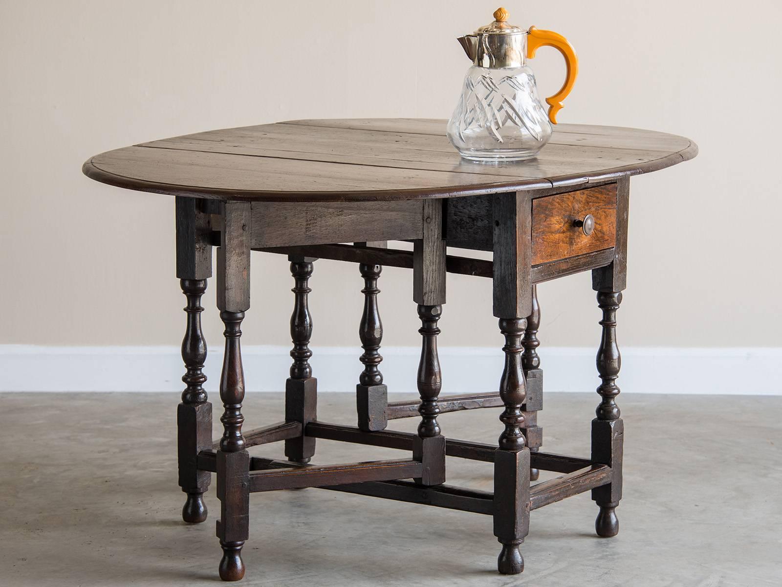 Receive our new selections direct from 1stdibs by email each week. Please click Follow Dealer below and see them first!

This antique English oak drop-leaf table, circa 1790 has a robust and bold profile. First appearing in seventeenth century