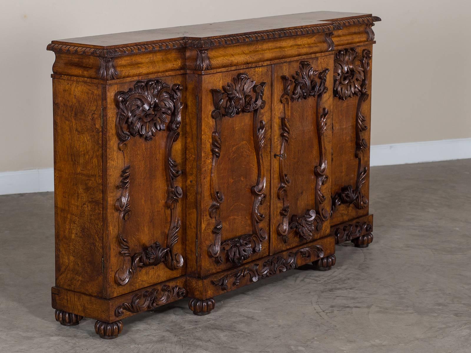 Receive our new selections direct from 1stdibs by email each week. Please click Follow Dealer below and see them first!

The elegantly extravagant carvings seen on this antique English pollard oak credenza buffet, circa 1850 give the facade its