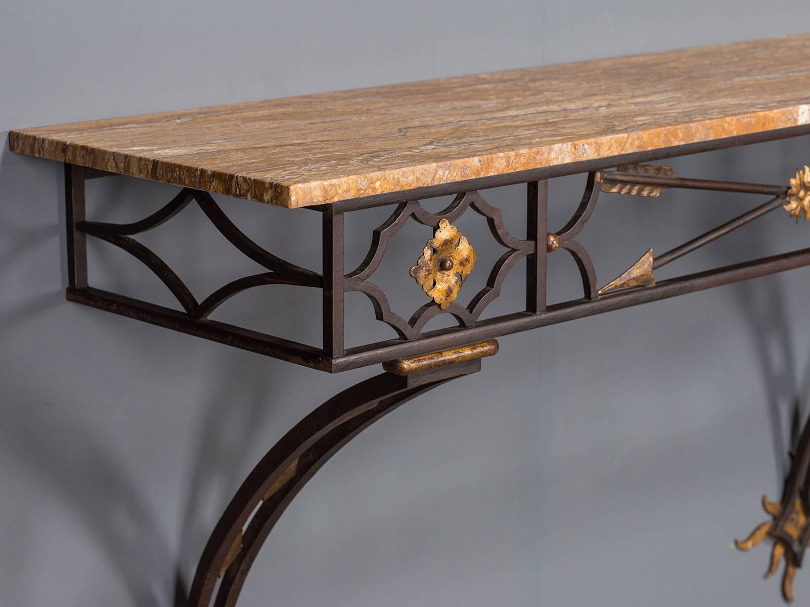 Receive our new selections direct from 1stdibs by email each week. Please click Follow Dealer below and see them first!

The glamour of French Art Deco is embodied in this vintage forged iron console table, circa 1930 with gilded highlights and a