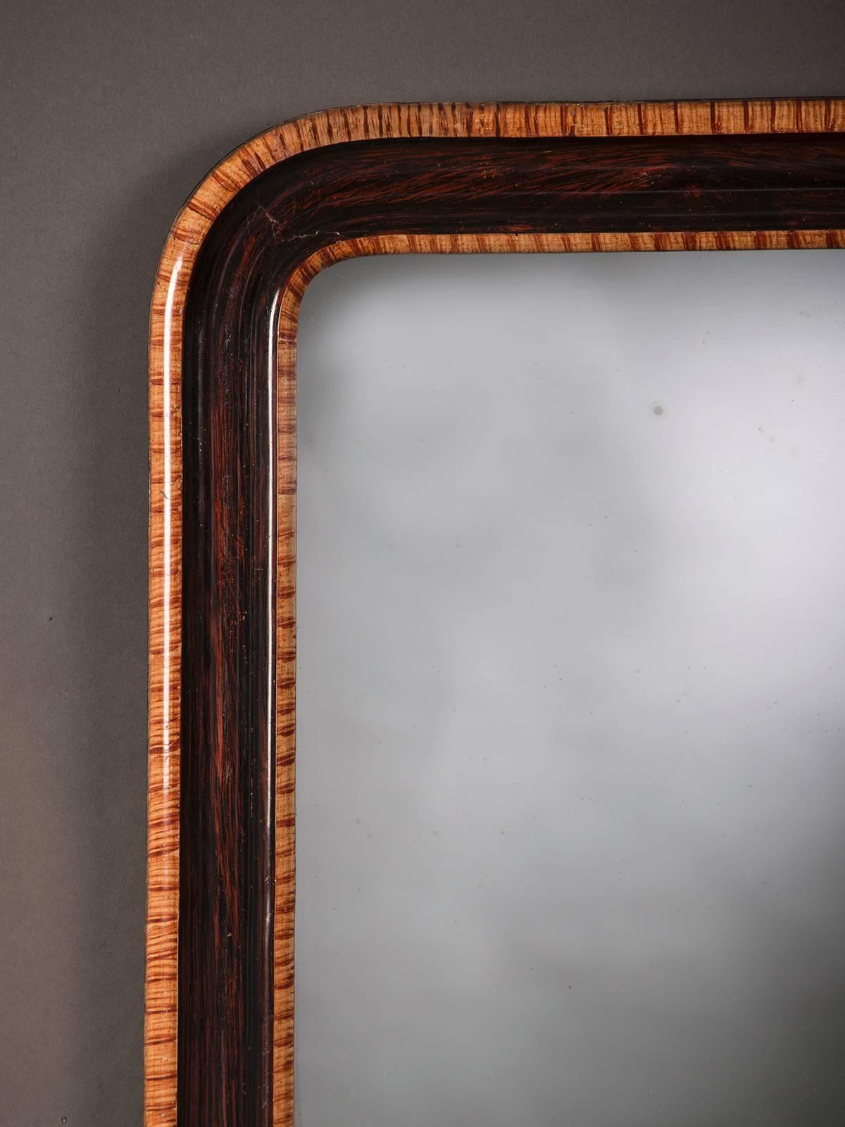 Receive our new selections direct from 1stdibs by email each week. Please click Follow Dealer below and see them first!

A chic and handsome antique French Louis Philippe mirror painted in a faux tortoise and rosewood pattern circa 1880