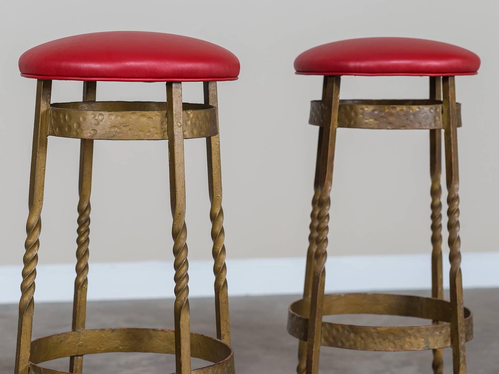 Receive our new selections direct from 1stdibs by email each week. Please click Follow Dealer below and see them first!

The forged iron on this set of vintage French Art Deco stools retains the original gilded finish, circa 1930. All four solid