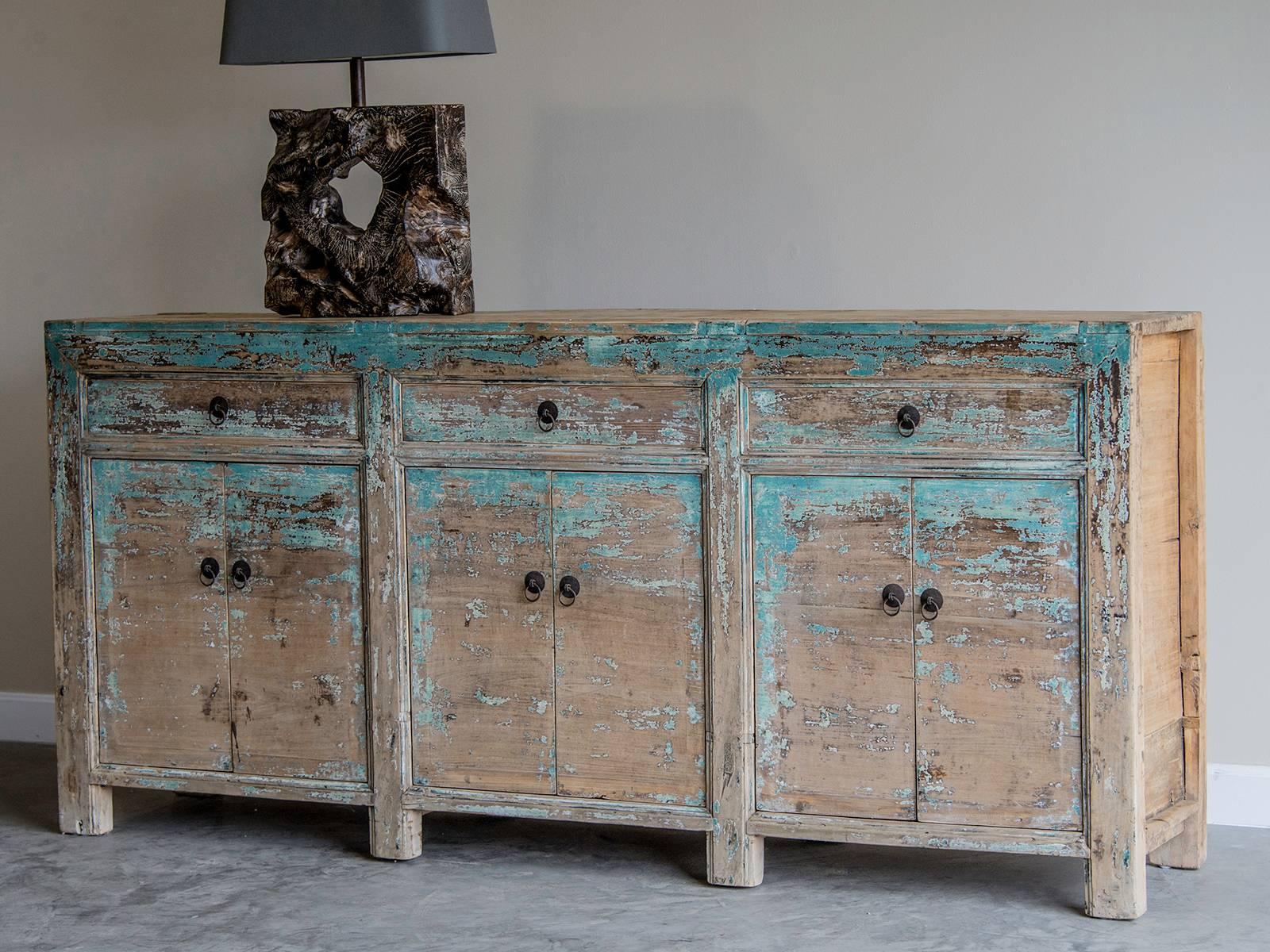 Receive our new selections direct from 1stdibs by email each week. Please click follow dealer below and see them first!

The turquoise color of the original paint on this vintage Chinese buffet circa 1900 is a beautiful contrast to the elmwood