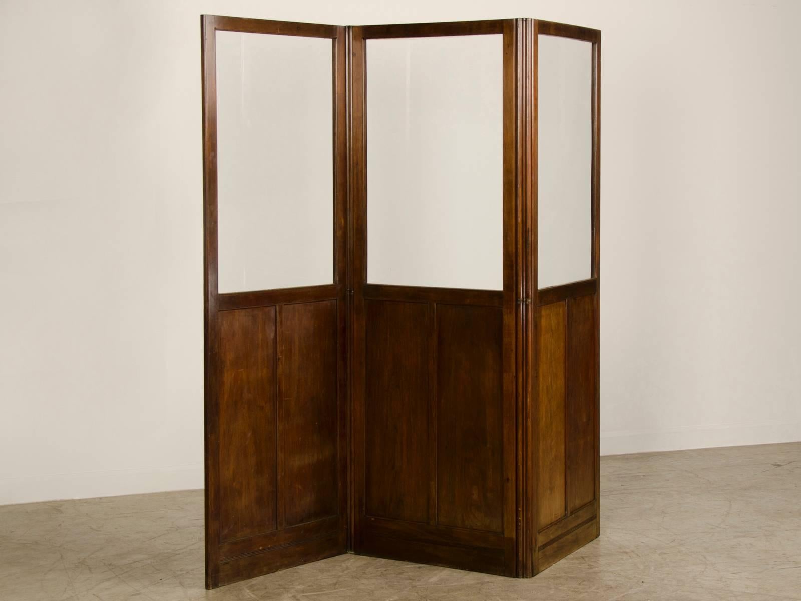 Receive our new selections direct from 1stdibs by email each week. Please click Follow Dealer below and see them first!

A very large antique English mahogany and glass folding screen, circa 1860. This amazing artifact from nineteenth century