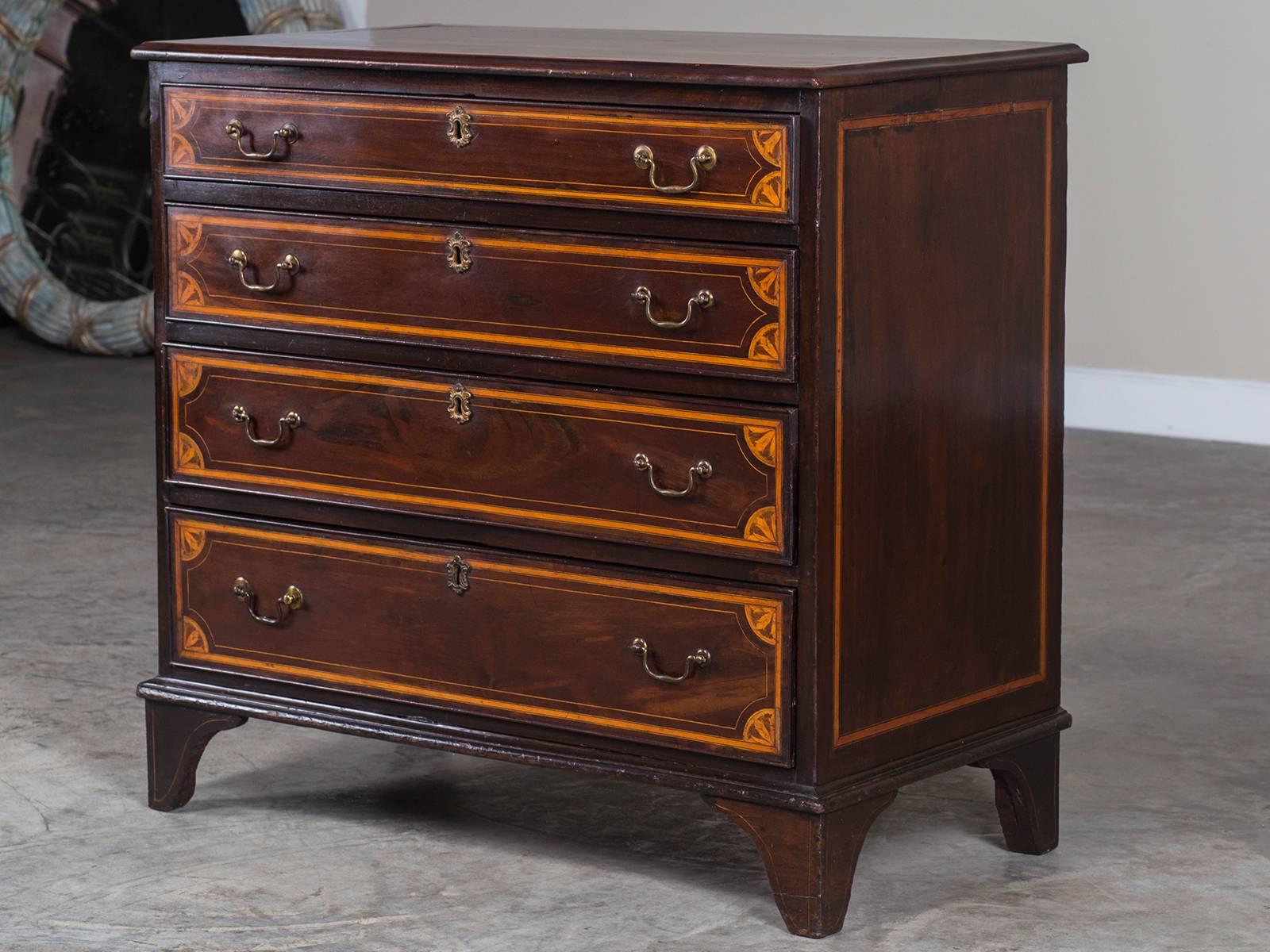 Receive our new selections direct from 1stdibs by email each week. Please click Follow Dealer below and see them first!

The visual contrast between the timbers on this antique English neoclassical mahogany chest of drawers circa 1860 is